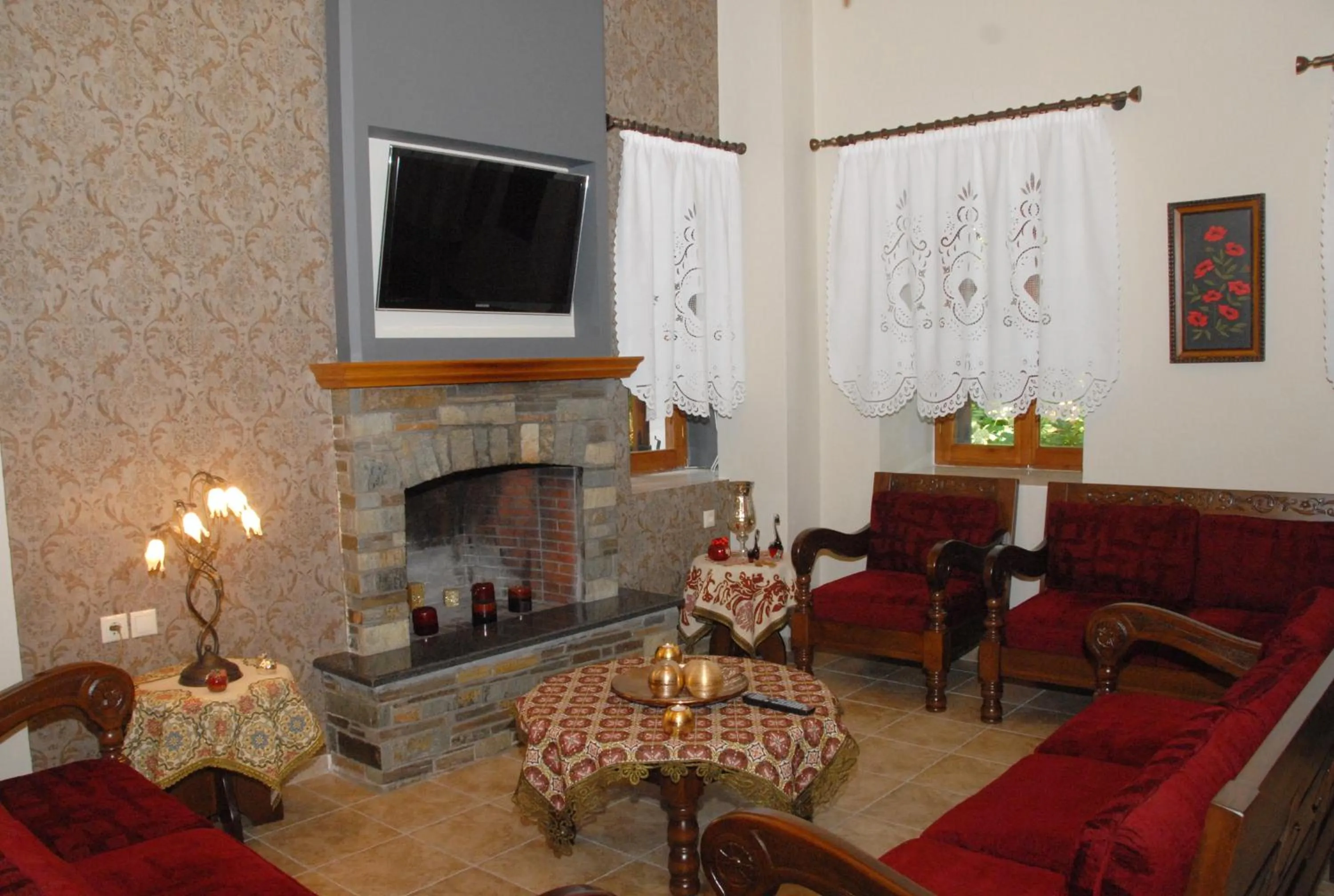 Communal lounge/ TV room in Hotel Filoxenia