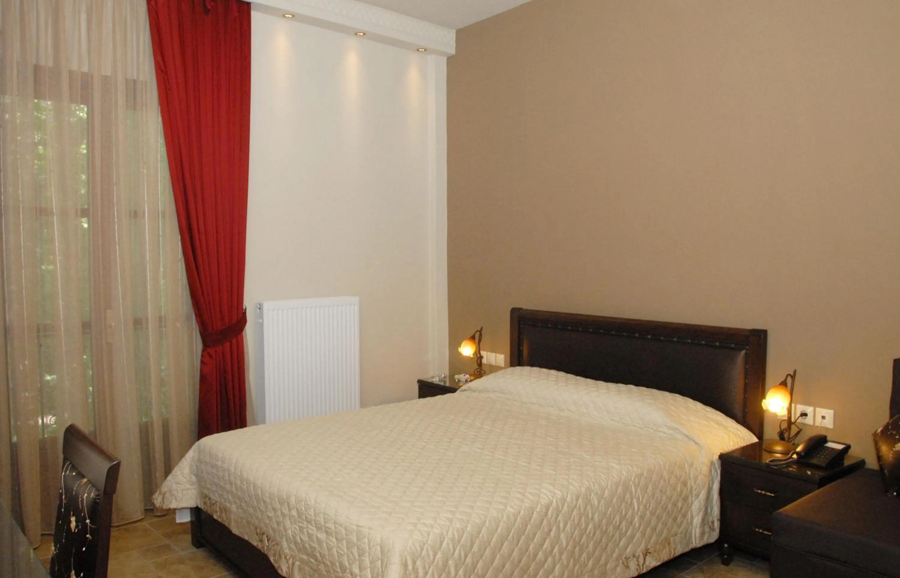 Bed in Hotel Filoxenia