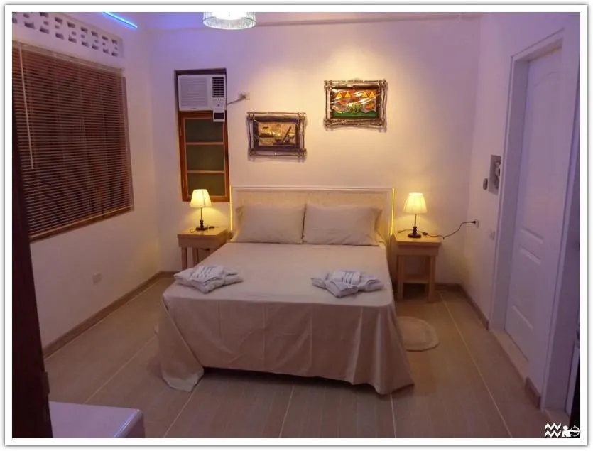 Bed in AABANA Beach & Watersport Resort