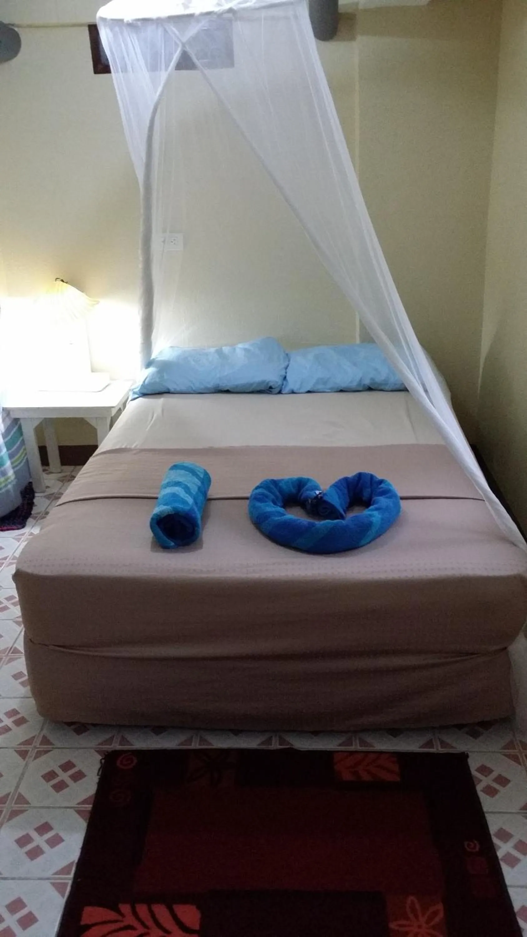 Bed in AABANA Beach & Watersport Resort
