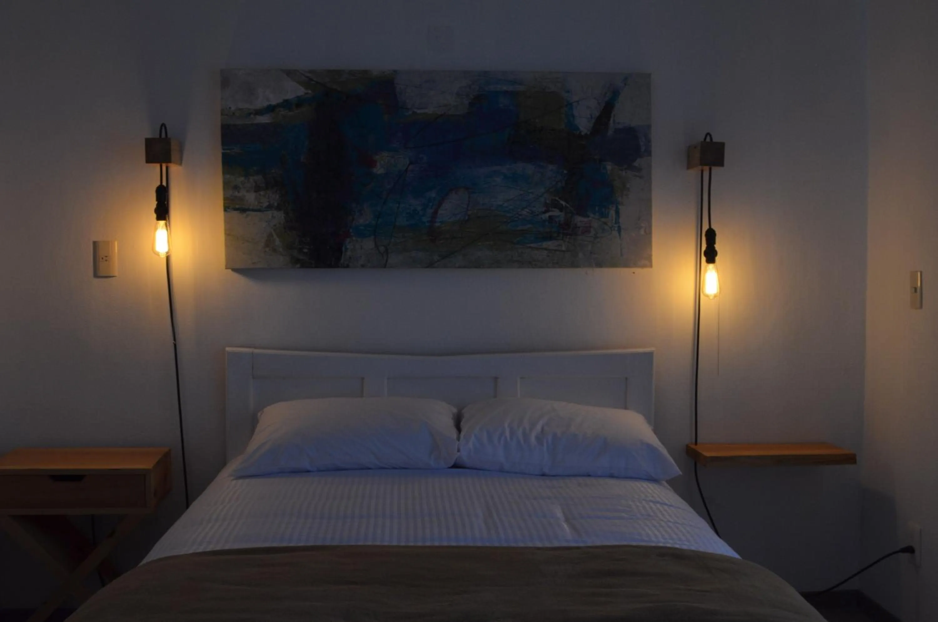 Bed in La Tozi Hotel