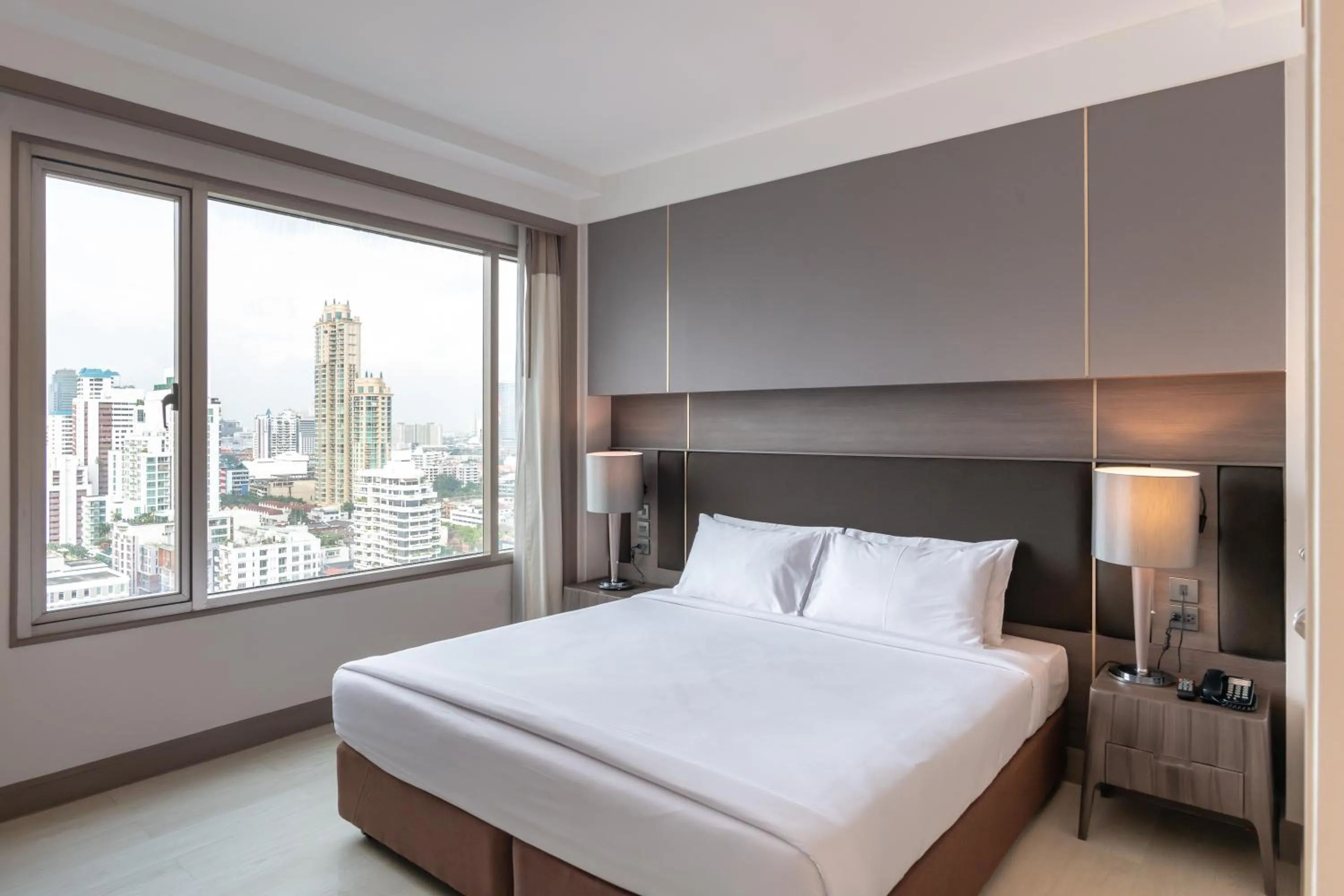 Bed in Jasmine City Hotel