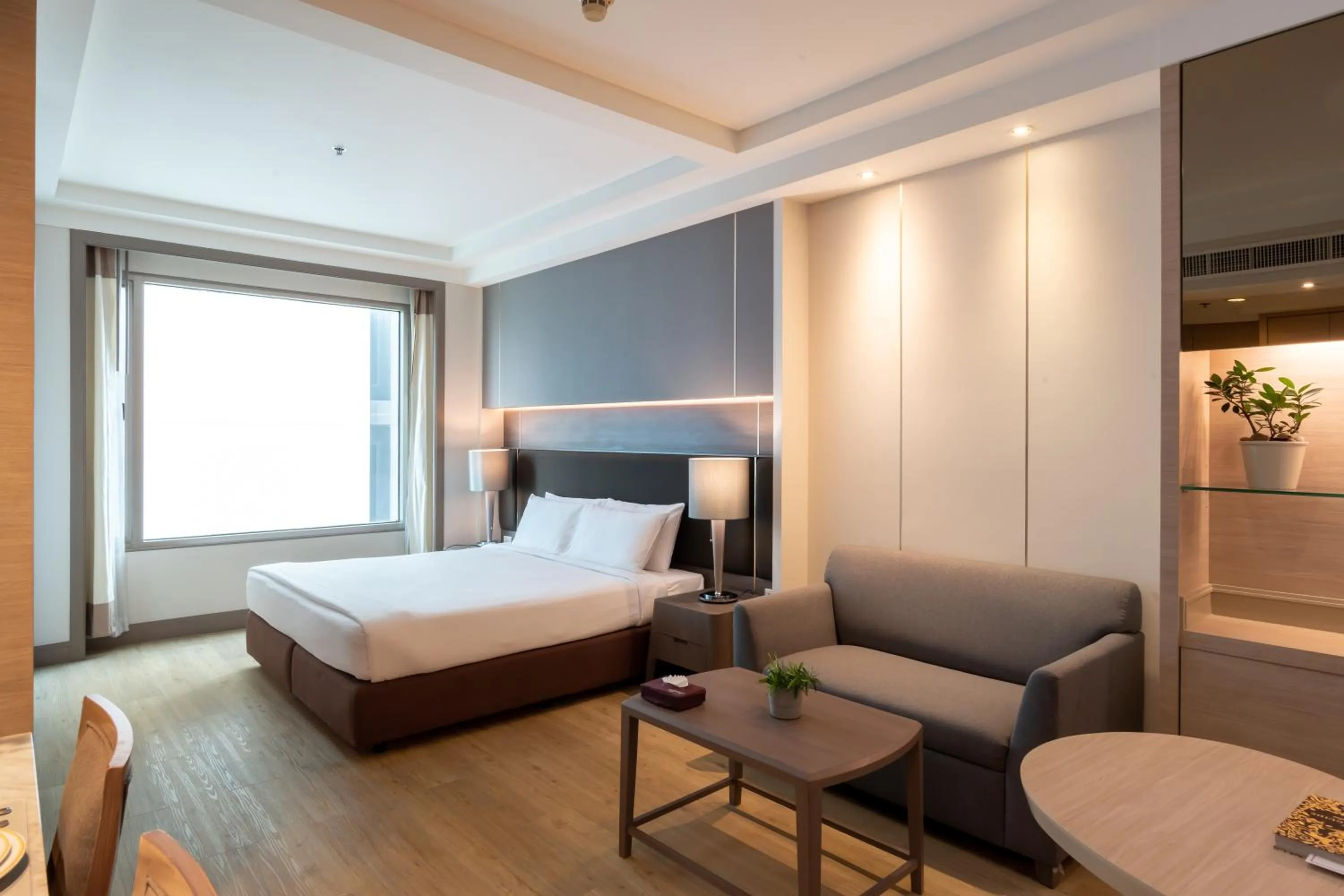 Bed in Jasmine City Hotel