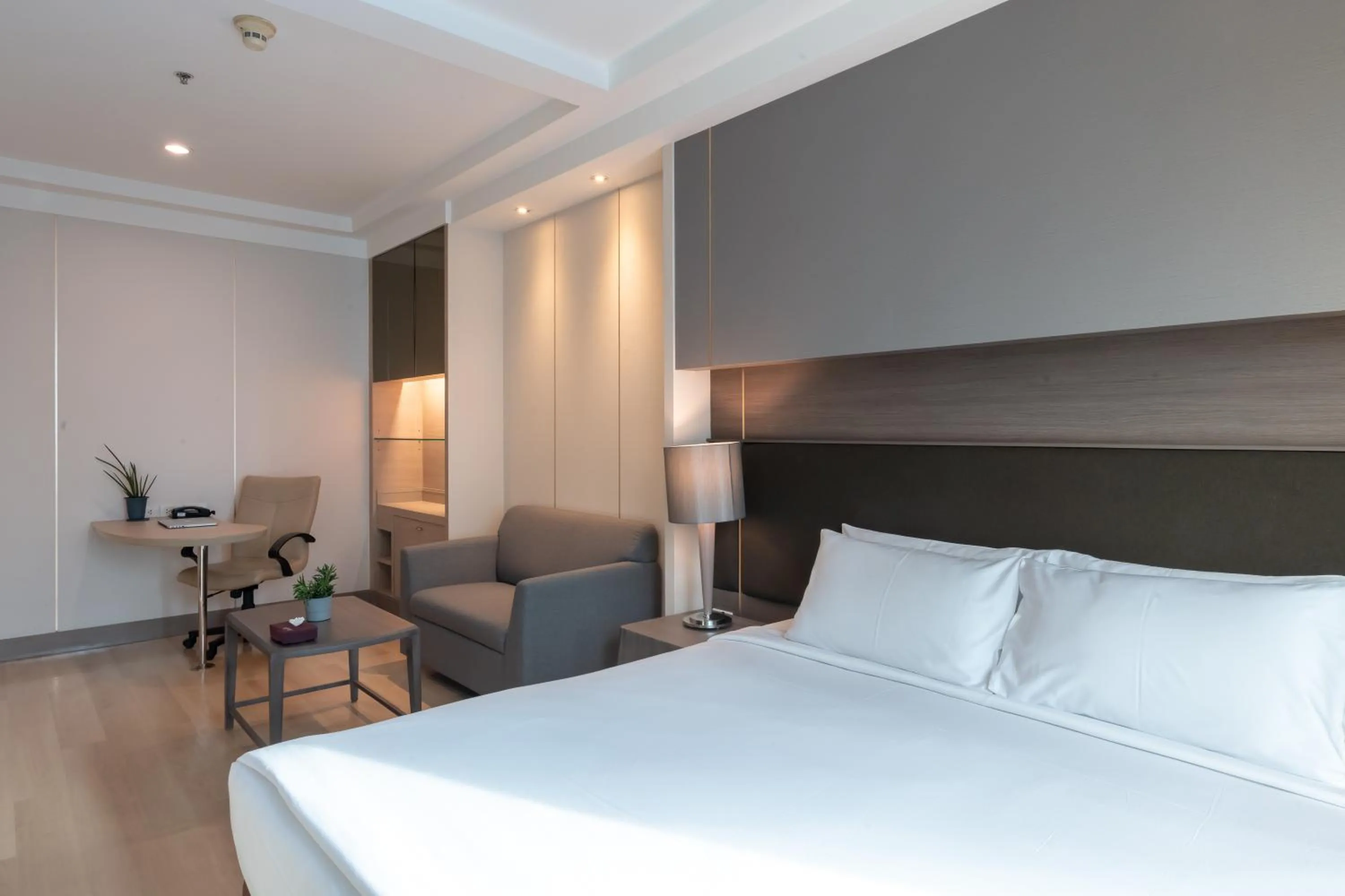 Bed in Jasmine City Hotel