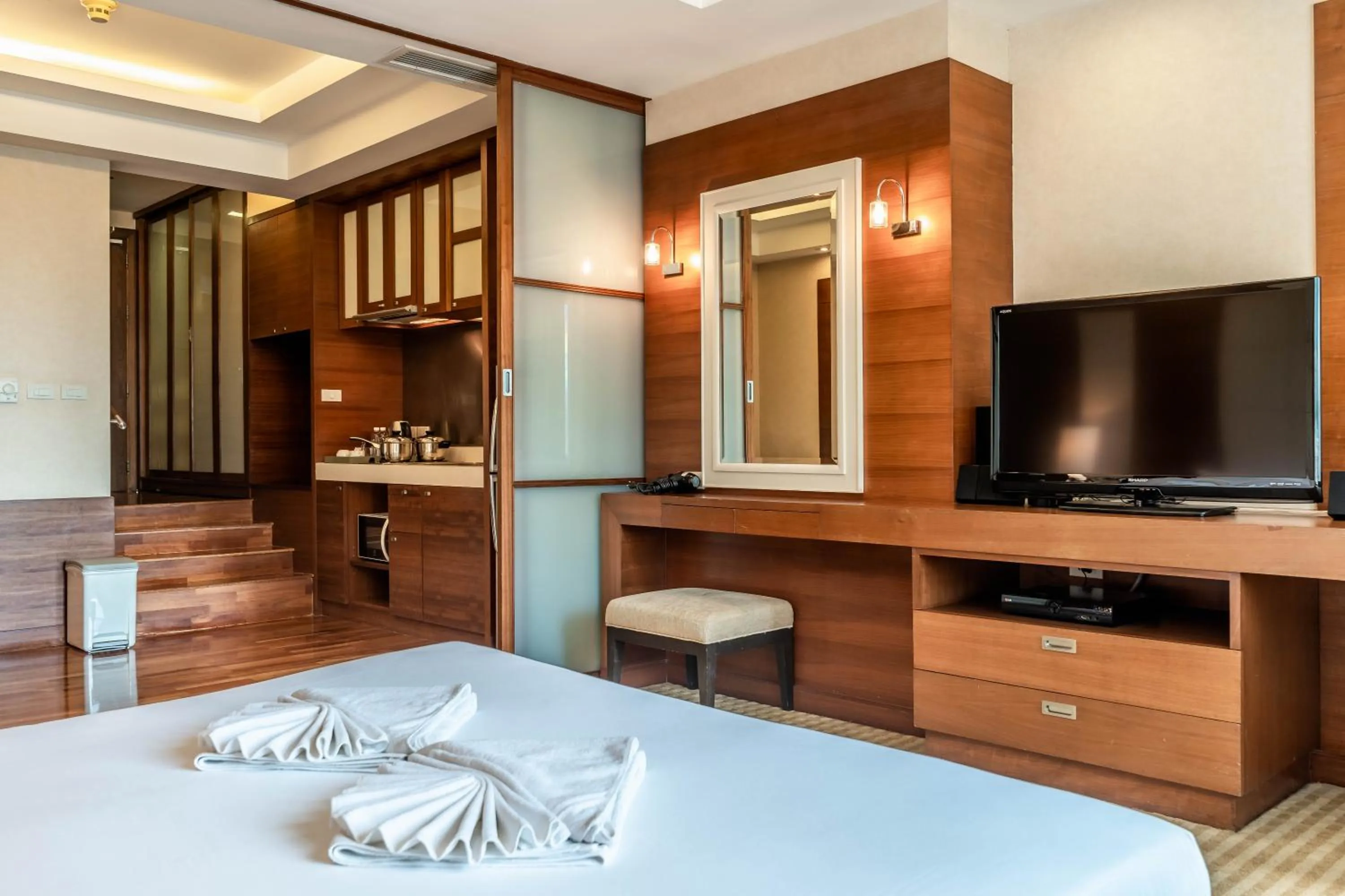 Bedroom in Jasmine City Hotel