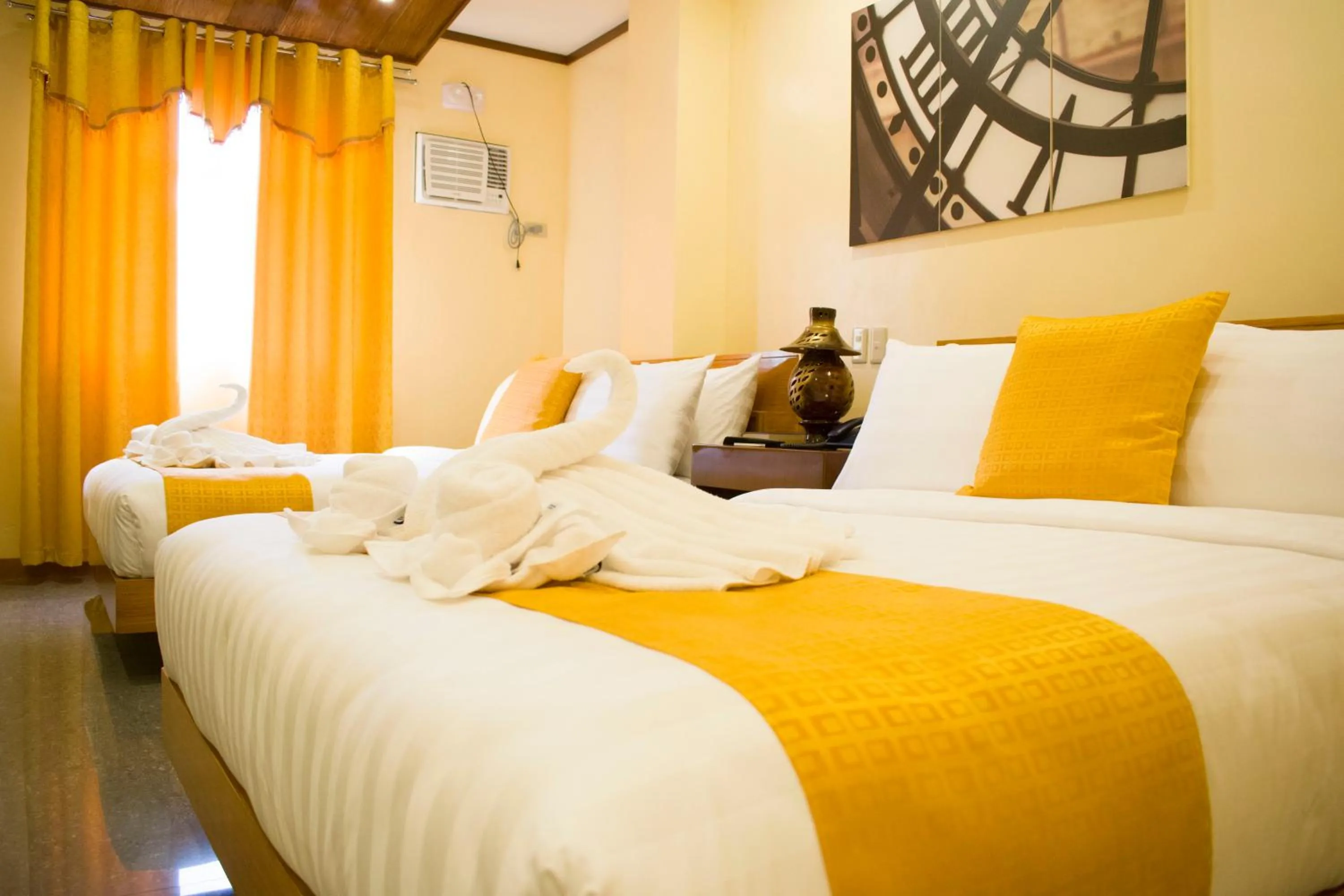 Bed in Royal Mansion Hotel