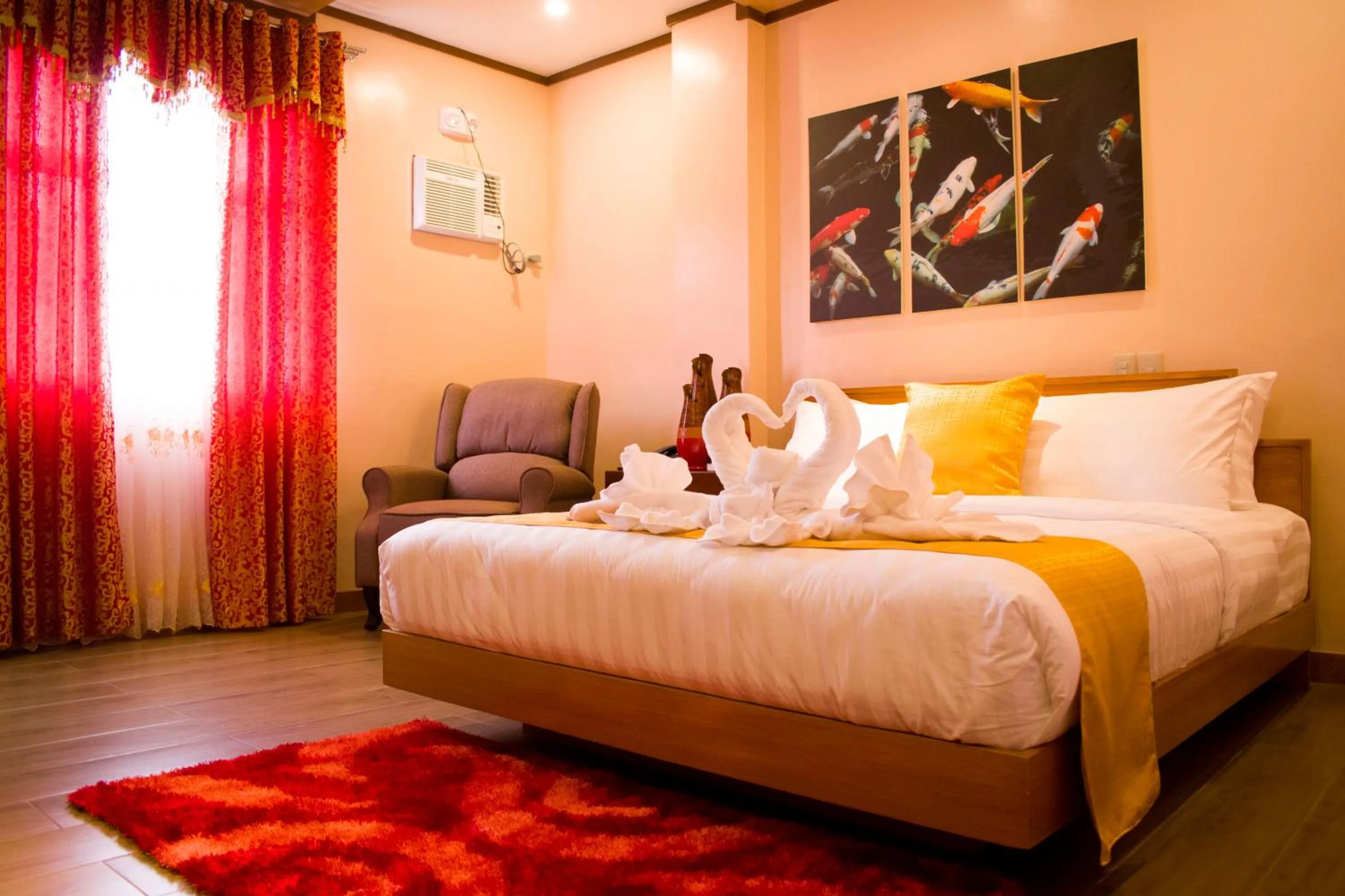 Bed in Royal Mansion Hotel