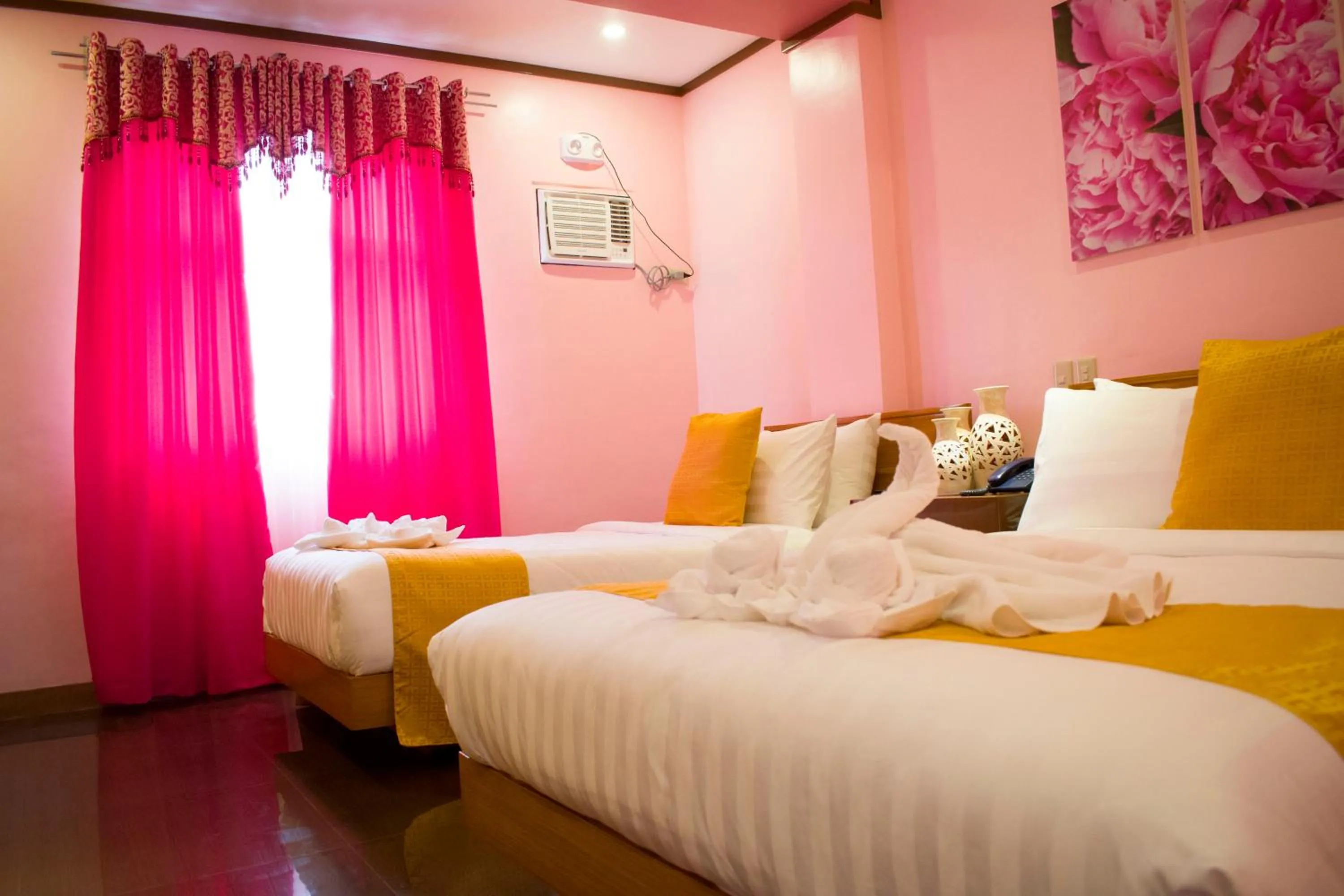 Bed in Royal Mansion Hotel