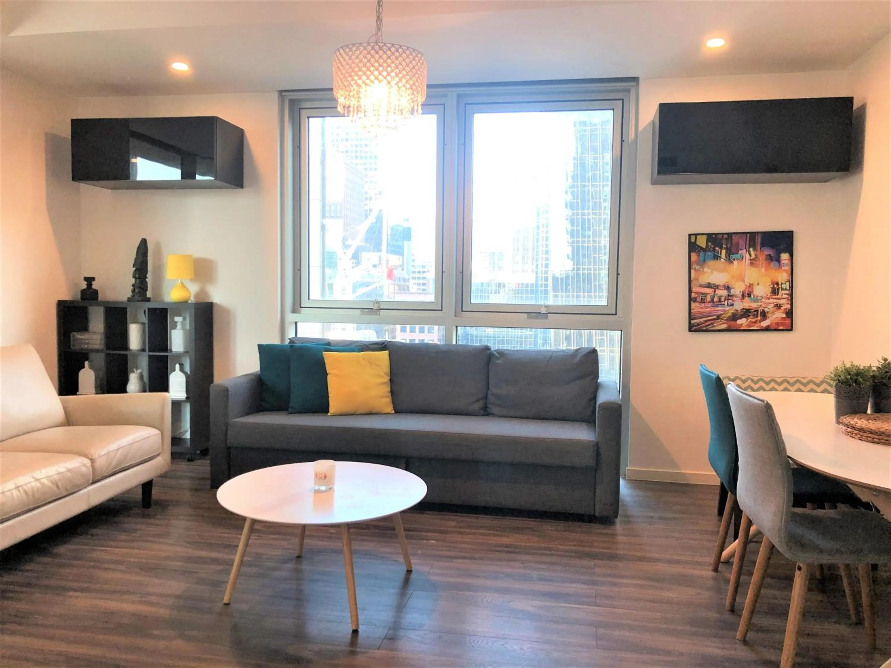 Living room, Bed in Readyset Apartments at Liberty