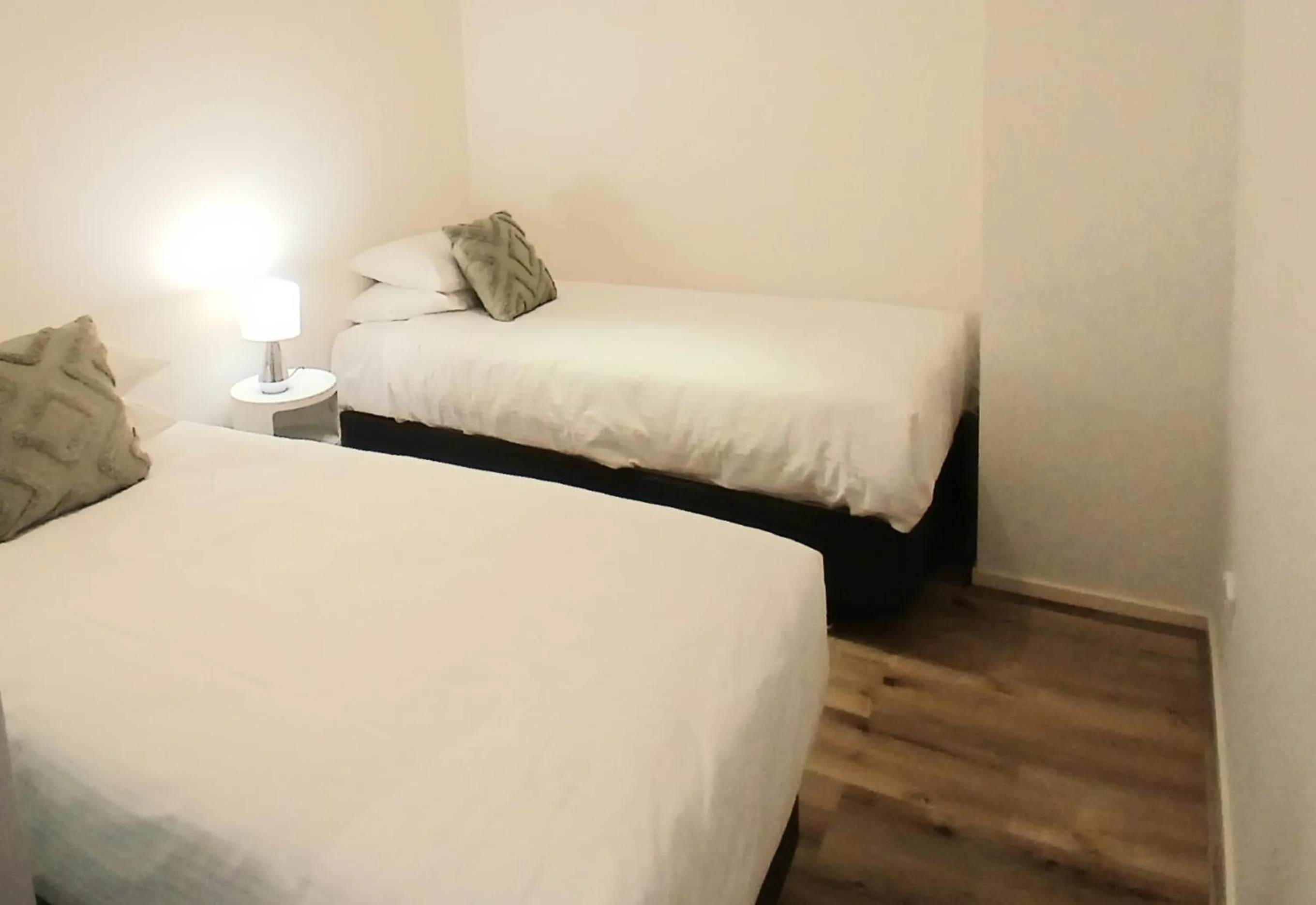 Bed in Readyset Apartments at Liberty