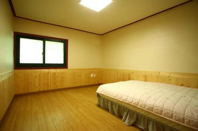 Bed in Bluesky Pension