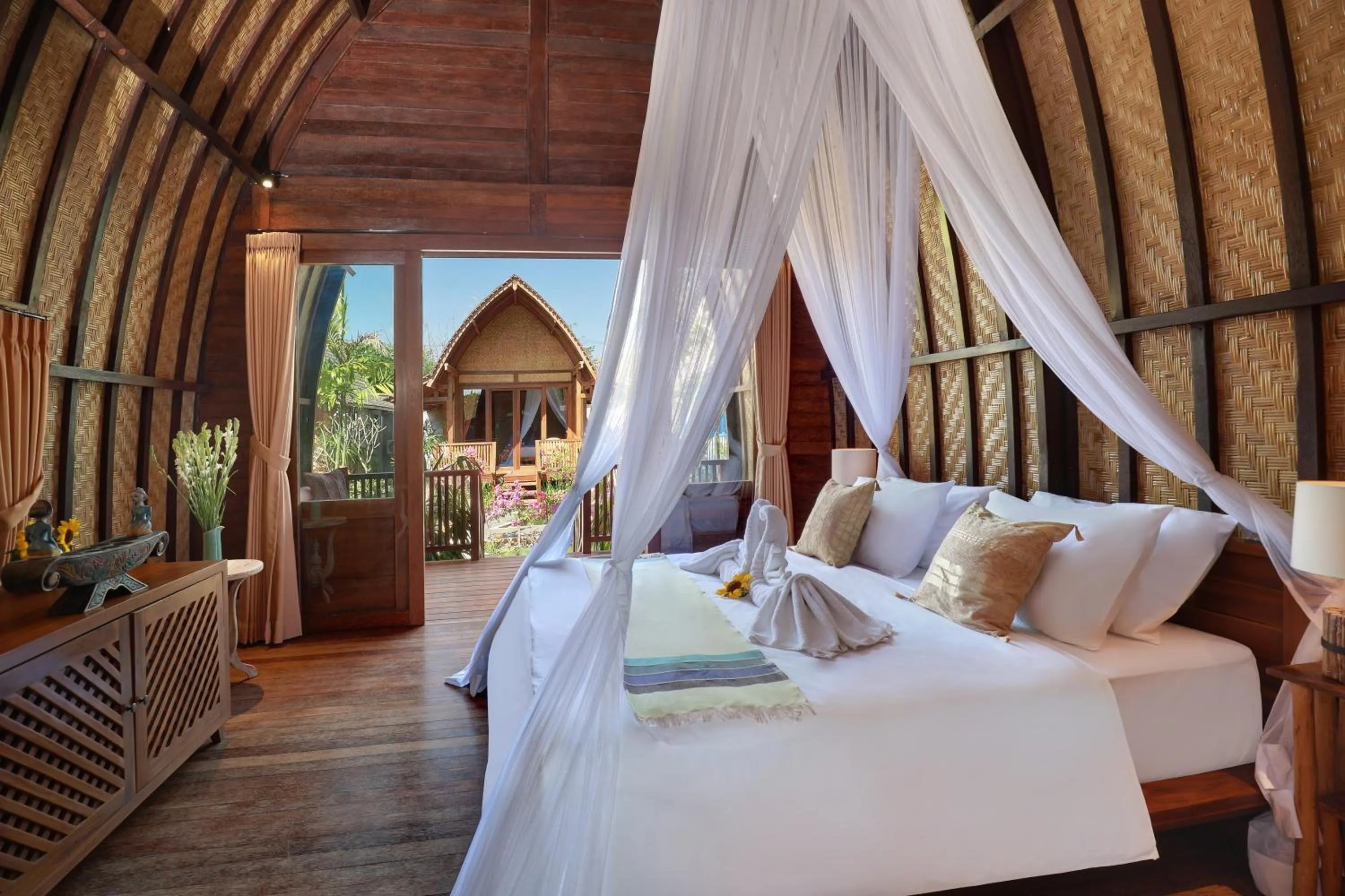 Bed in Uluwatu Lumbung Cottages