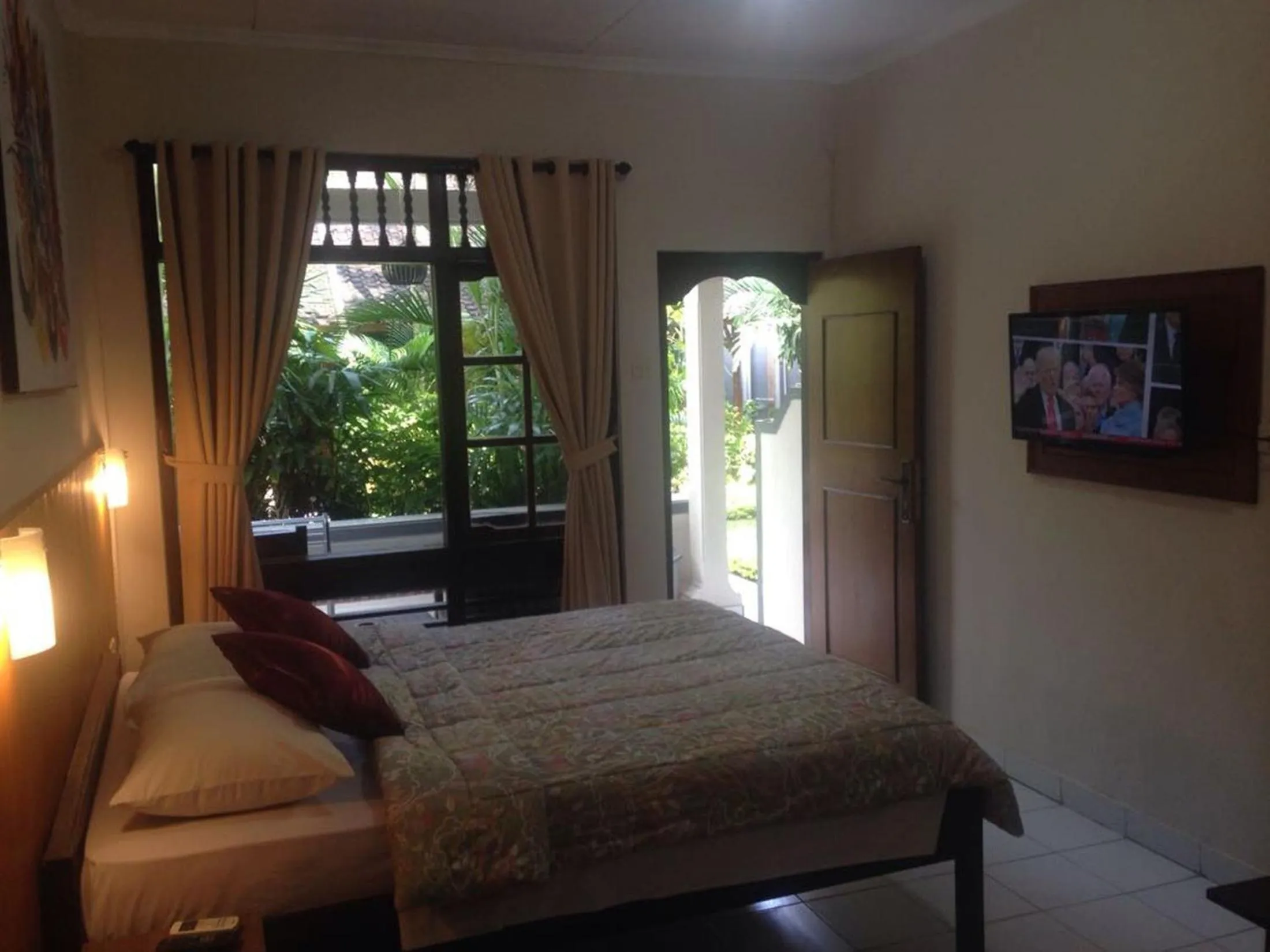 Photo of the whole room, Bed in Dewa Bharata Bungalows Candidasa
