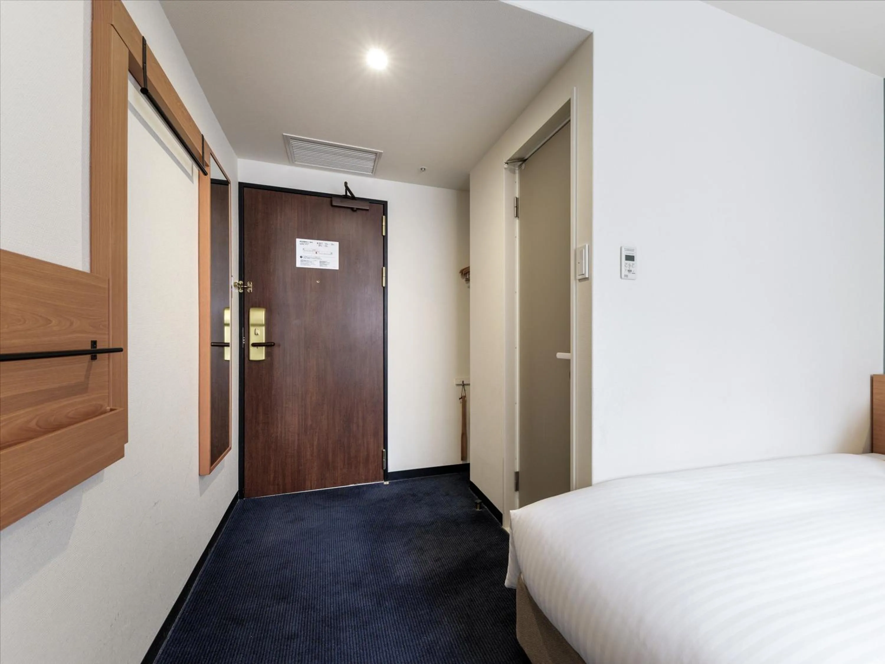 Photo of the whole room, Bed in Nishitetsu Inn Shinjuku