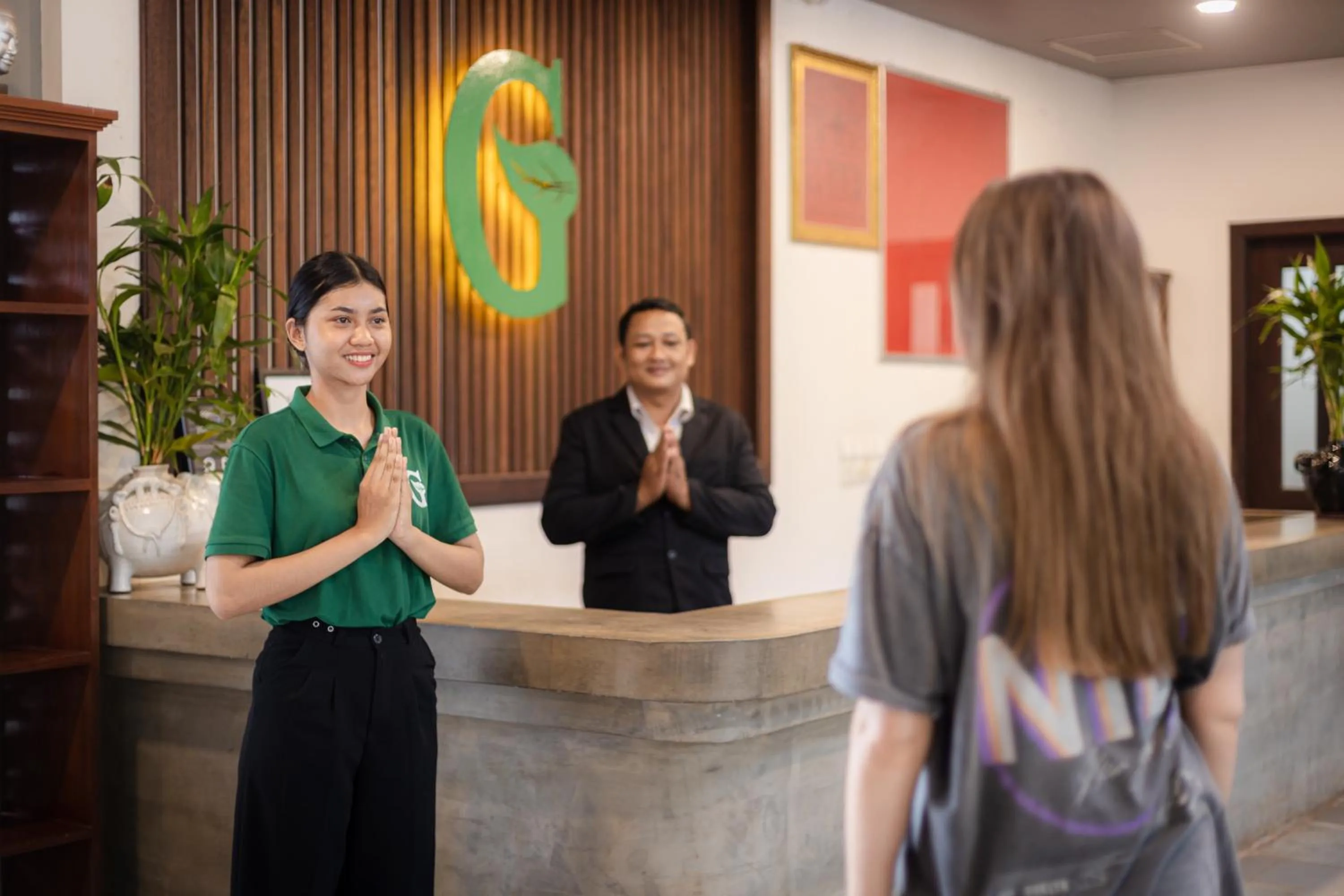 Staff in Green Amazon Residence