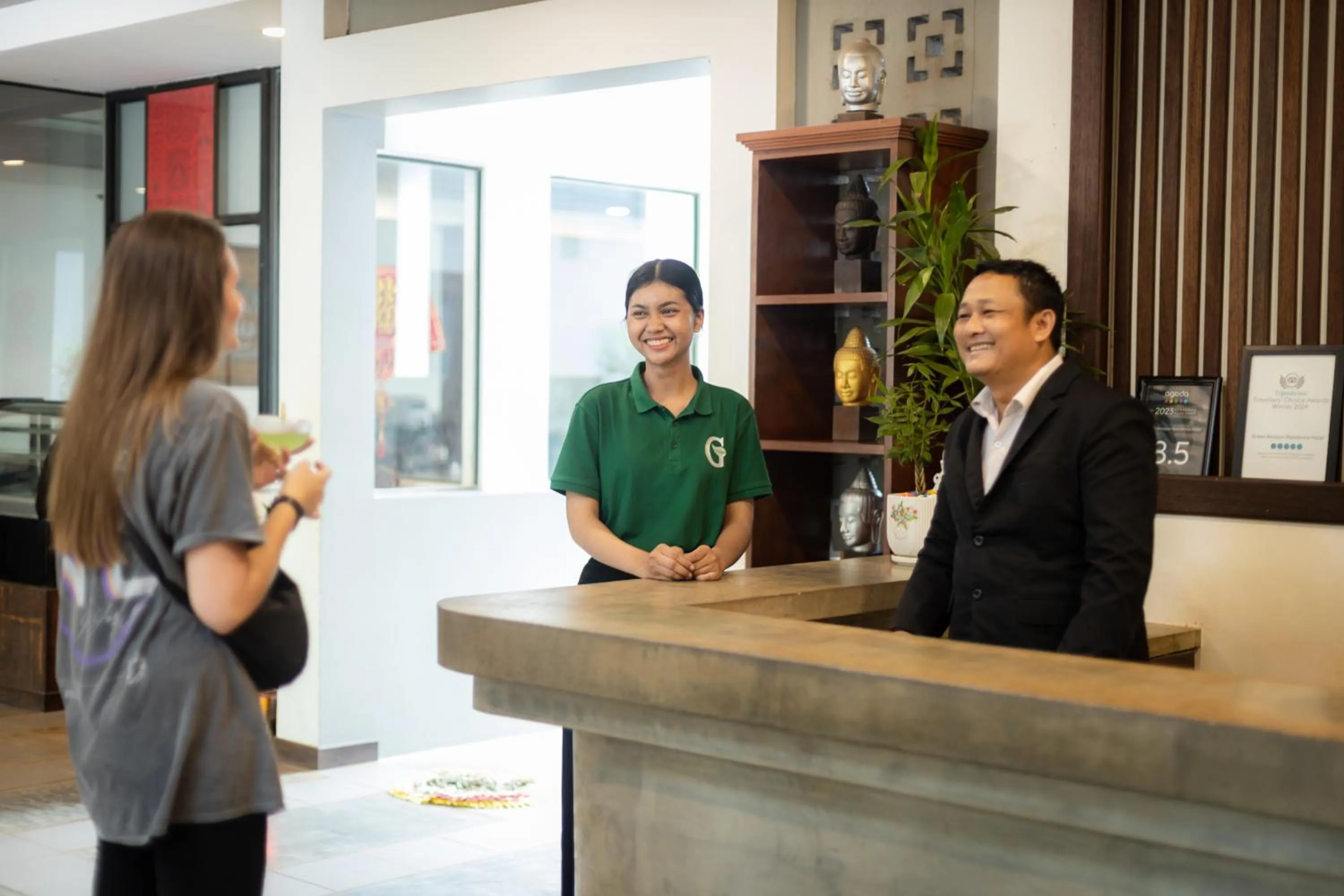 Staff in Green Amazon Residence