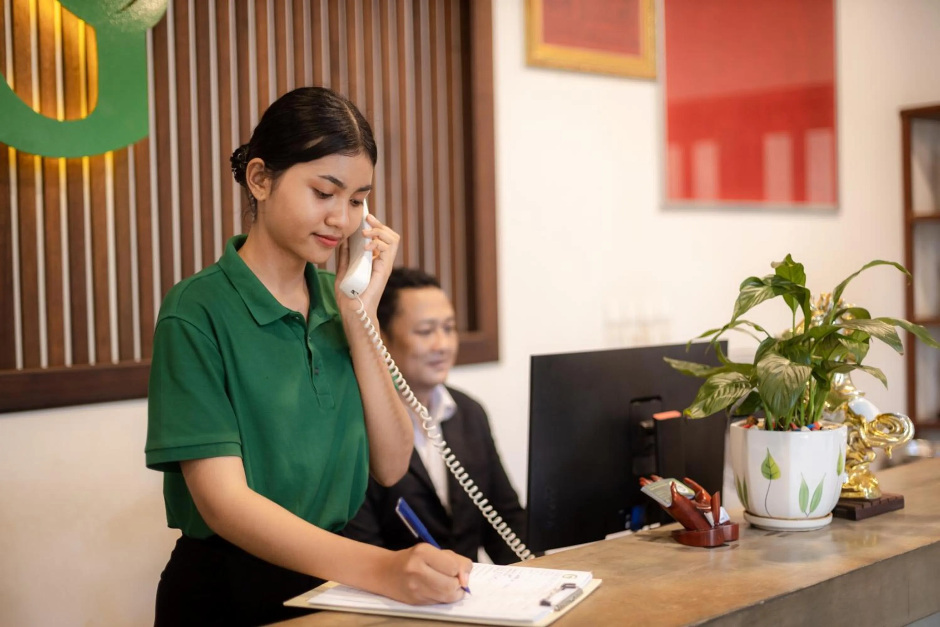 Staff in Green Amazon Residence
