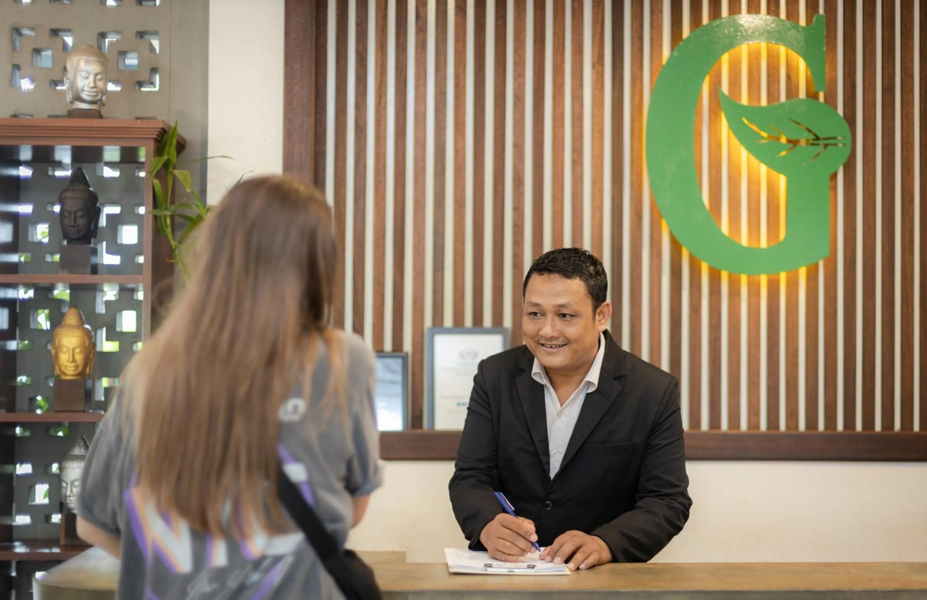 Staff in Green Amazon Residence