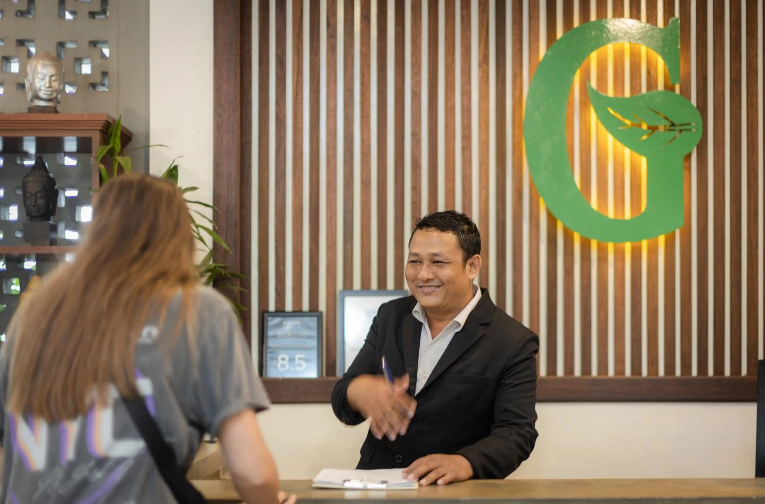 Staff in Green Amazon Residence
