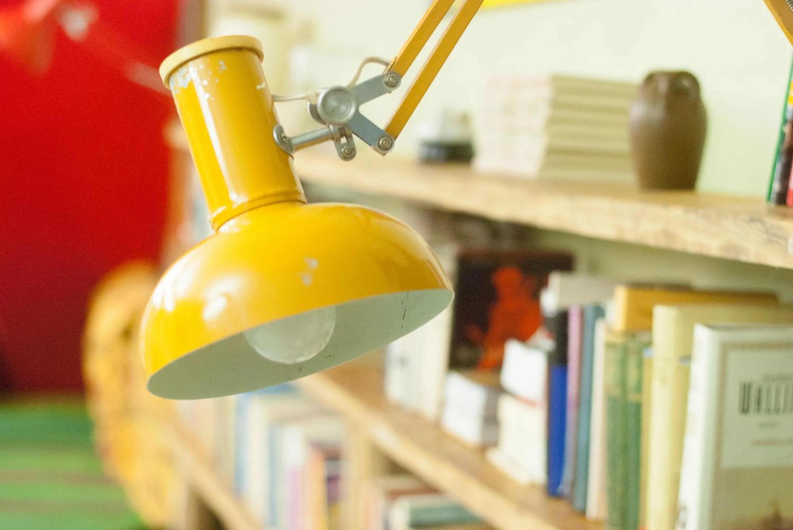 Communal lounge/ TV room in Looming Hostel