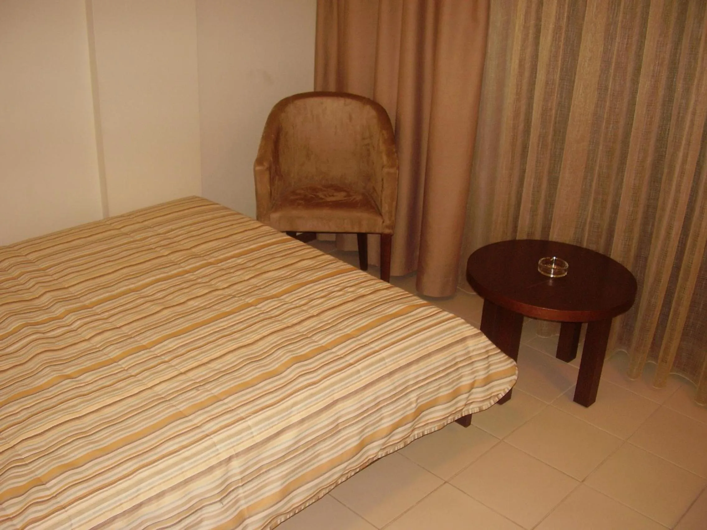 Bed in Hotel Electra