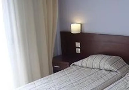 Bed in Hotel Electra