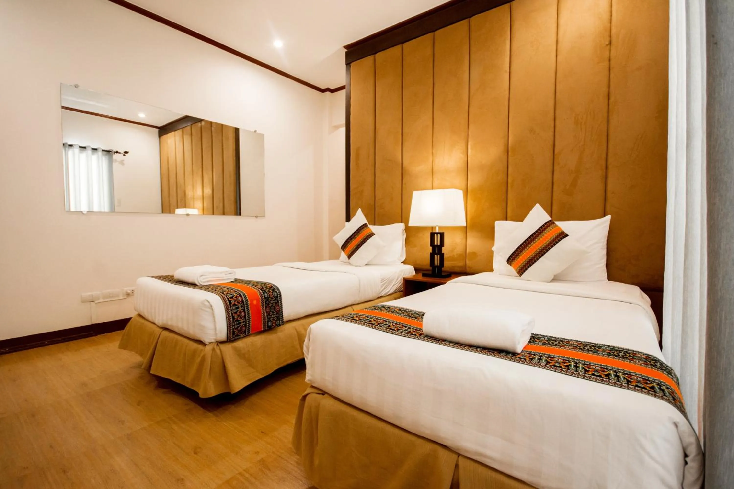 Bed in Sur Beach Resort Boracay