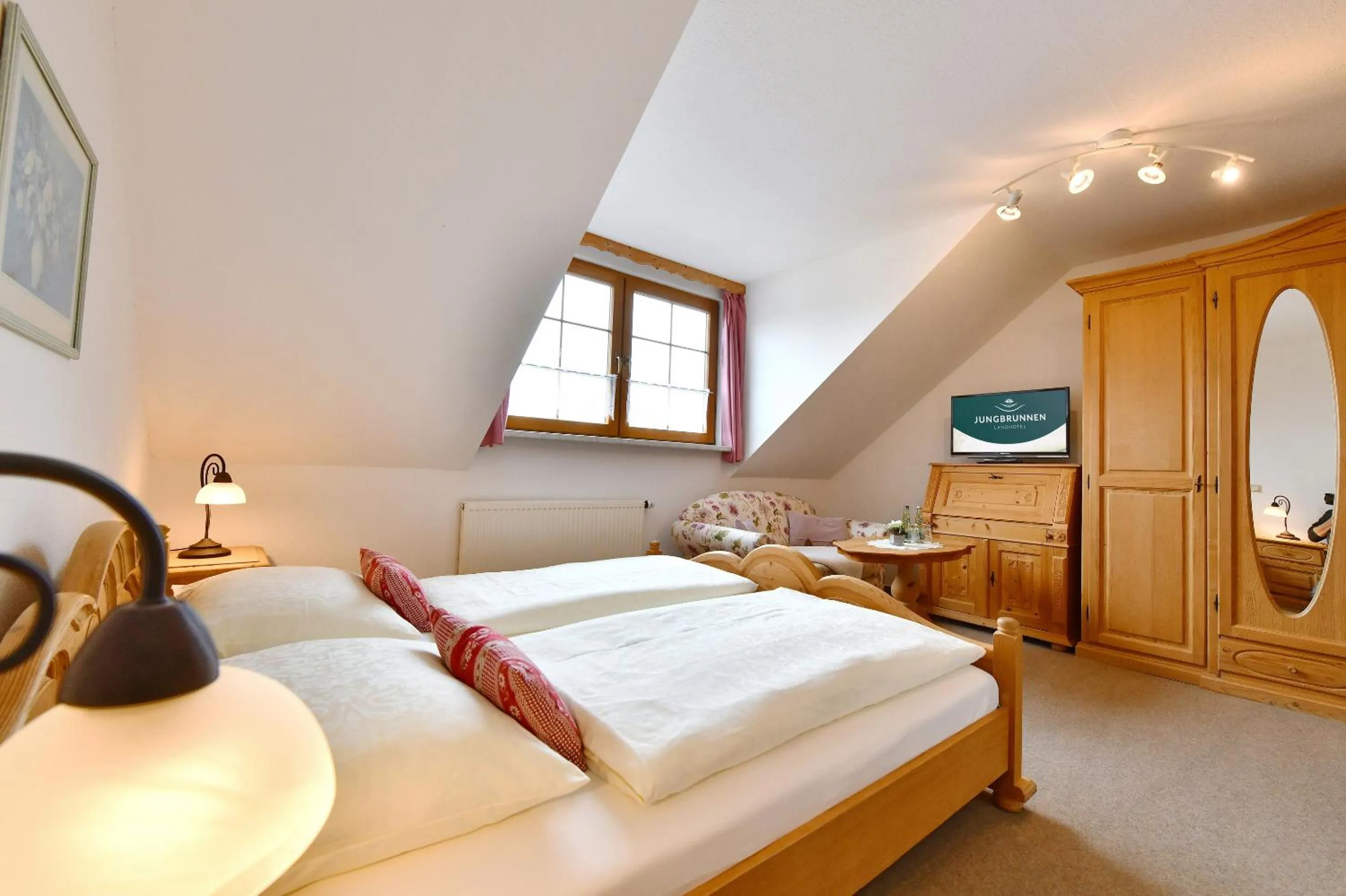 Photo of the whole room, Bed in Landhotel Jungbrunnen