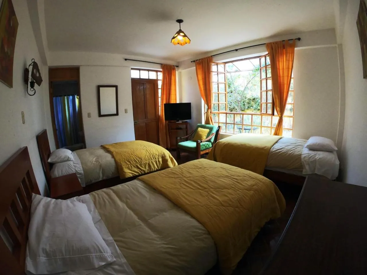 Photo of the whole room, Bed in Amaru Valle Hotel