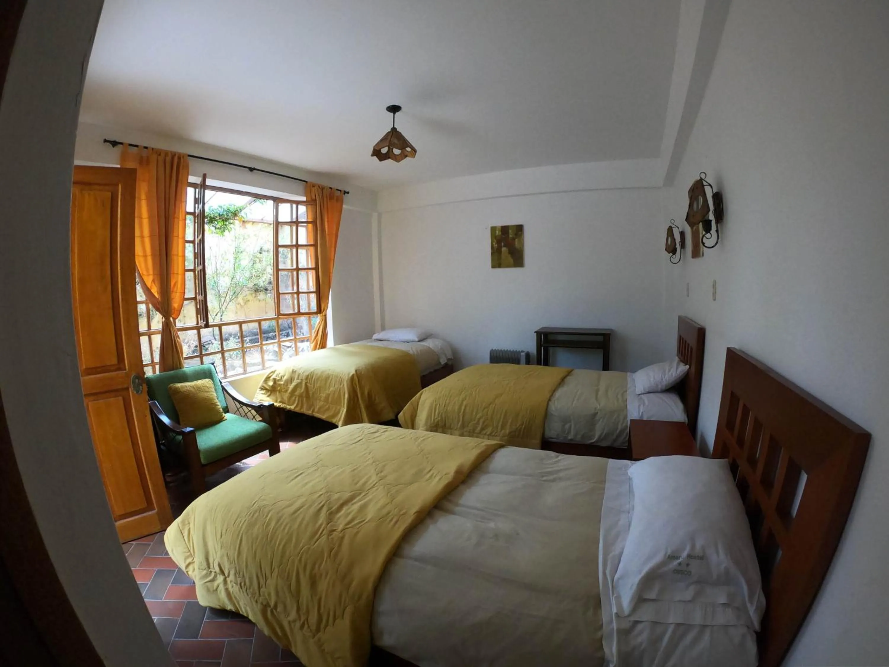 Bed in Amaru Valle Hotel