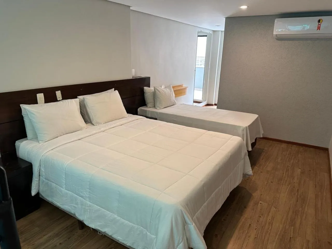 Bed in Bahamas Duplex by WS