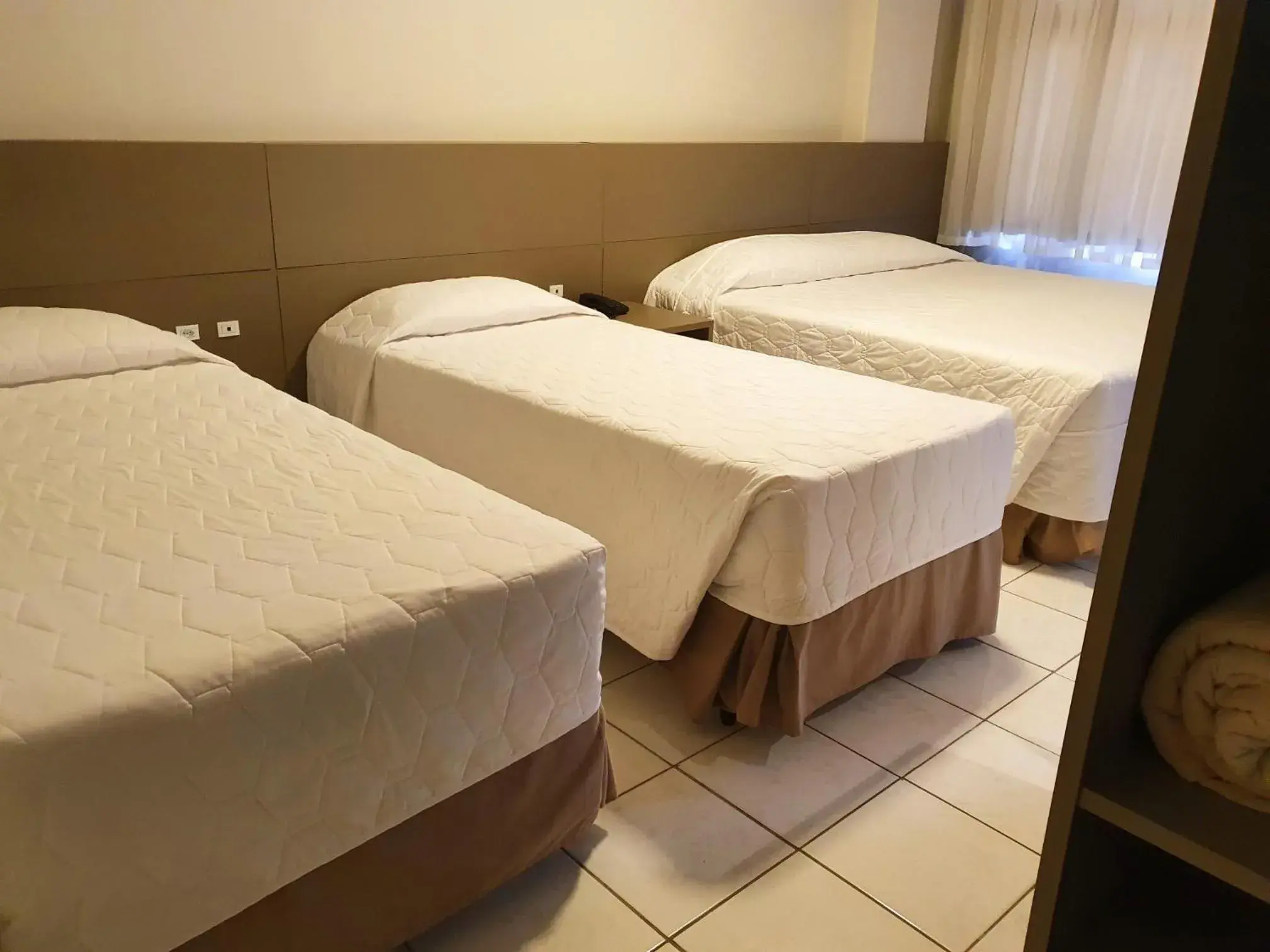 Superior Quadruple Room in Hotel Gumz Superior Quadruple Room in Hotel Gumz