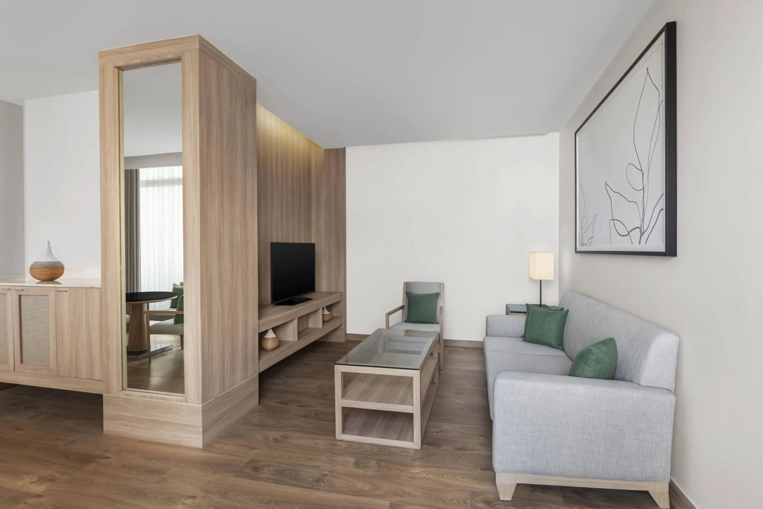 Living room in Courtyard by Marriott Bangkok