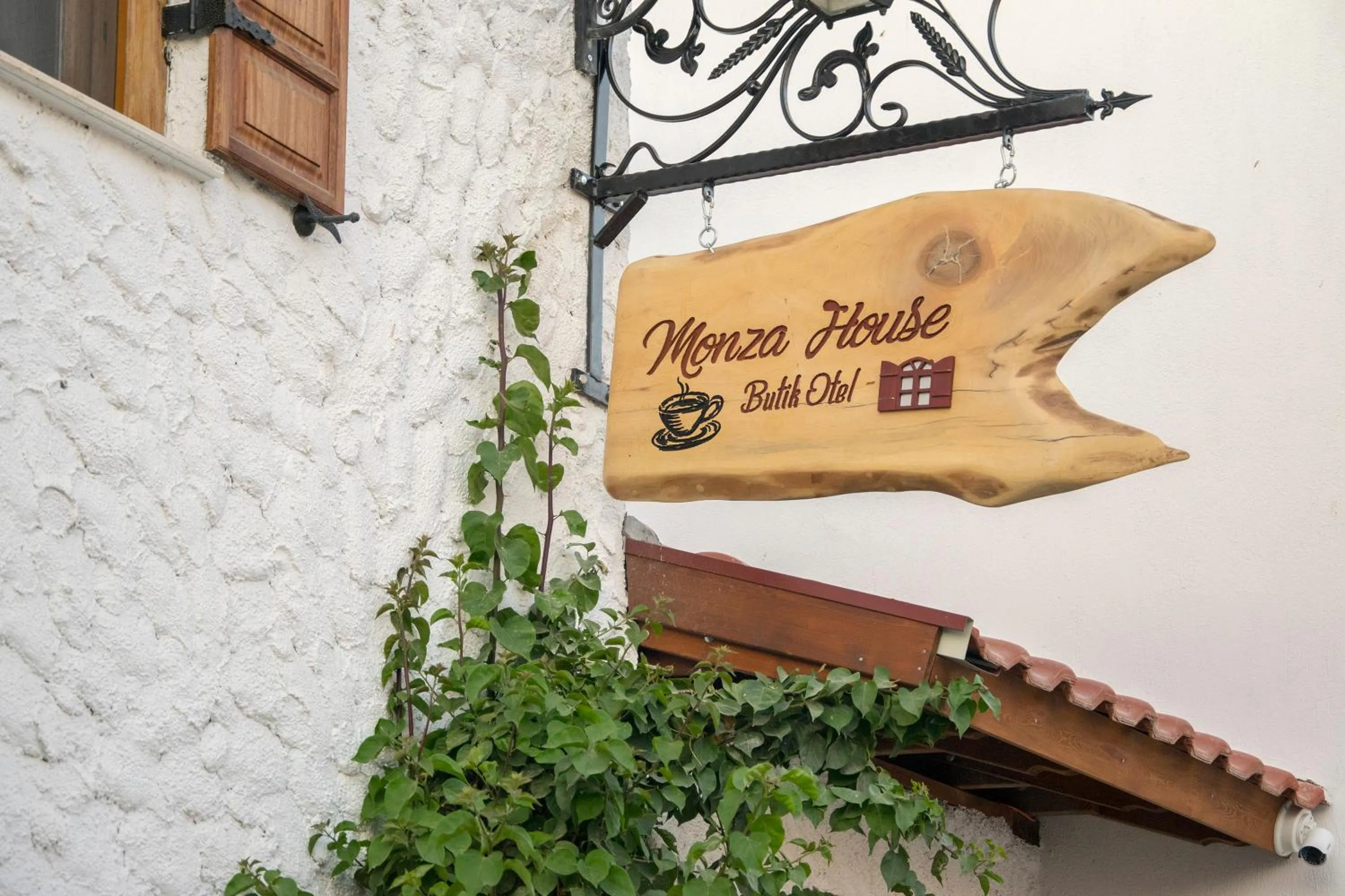 Property logo or sign in Monza House Otel