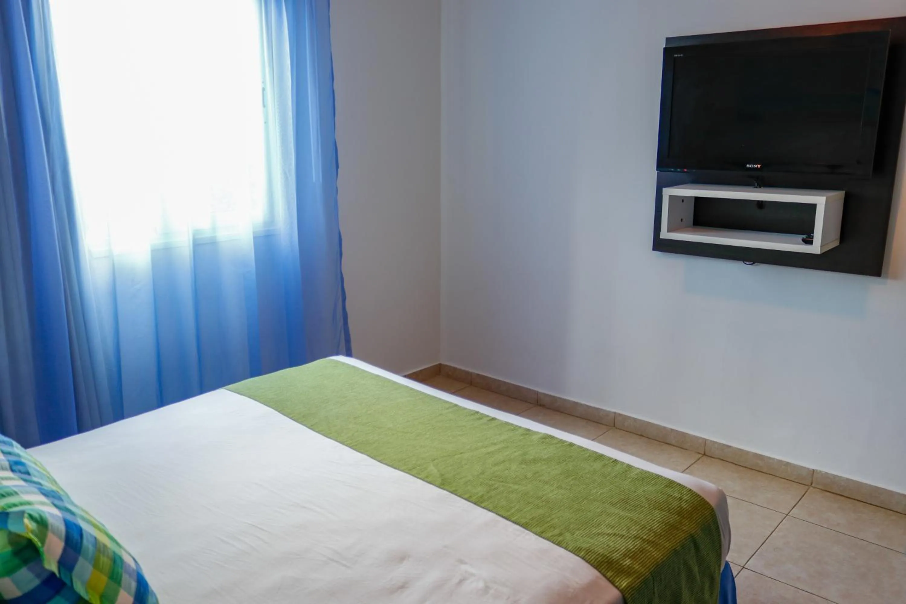 Photo of the whole room, Bed in Club Punta Playa Hotel