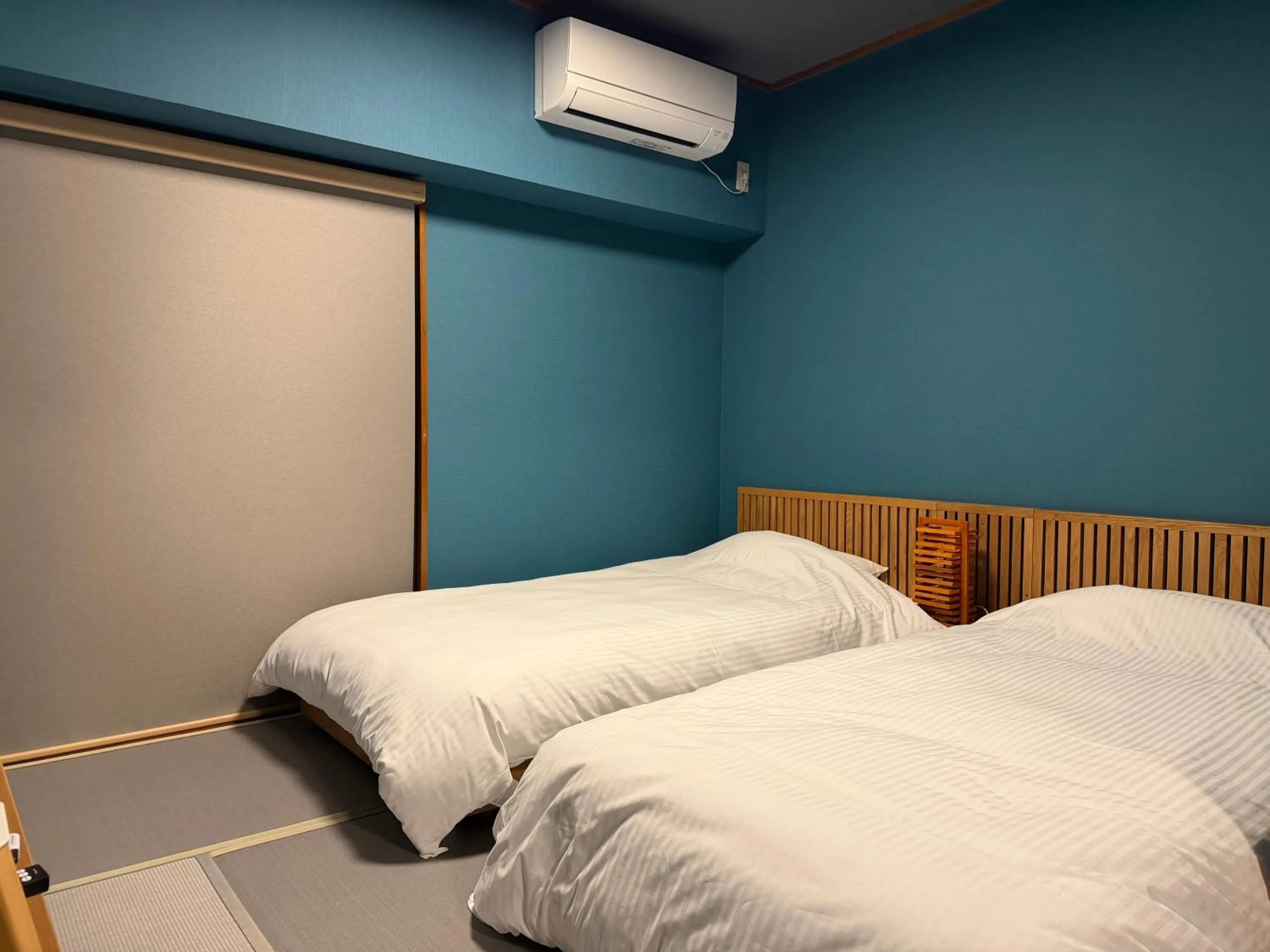 Bed in Kokusai Towns Inn