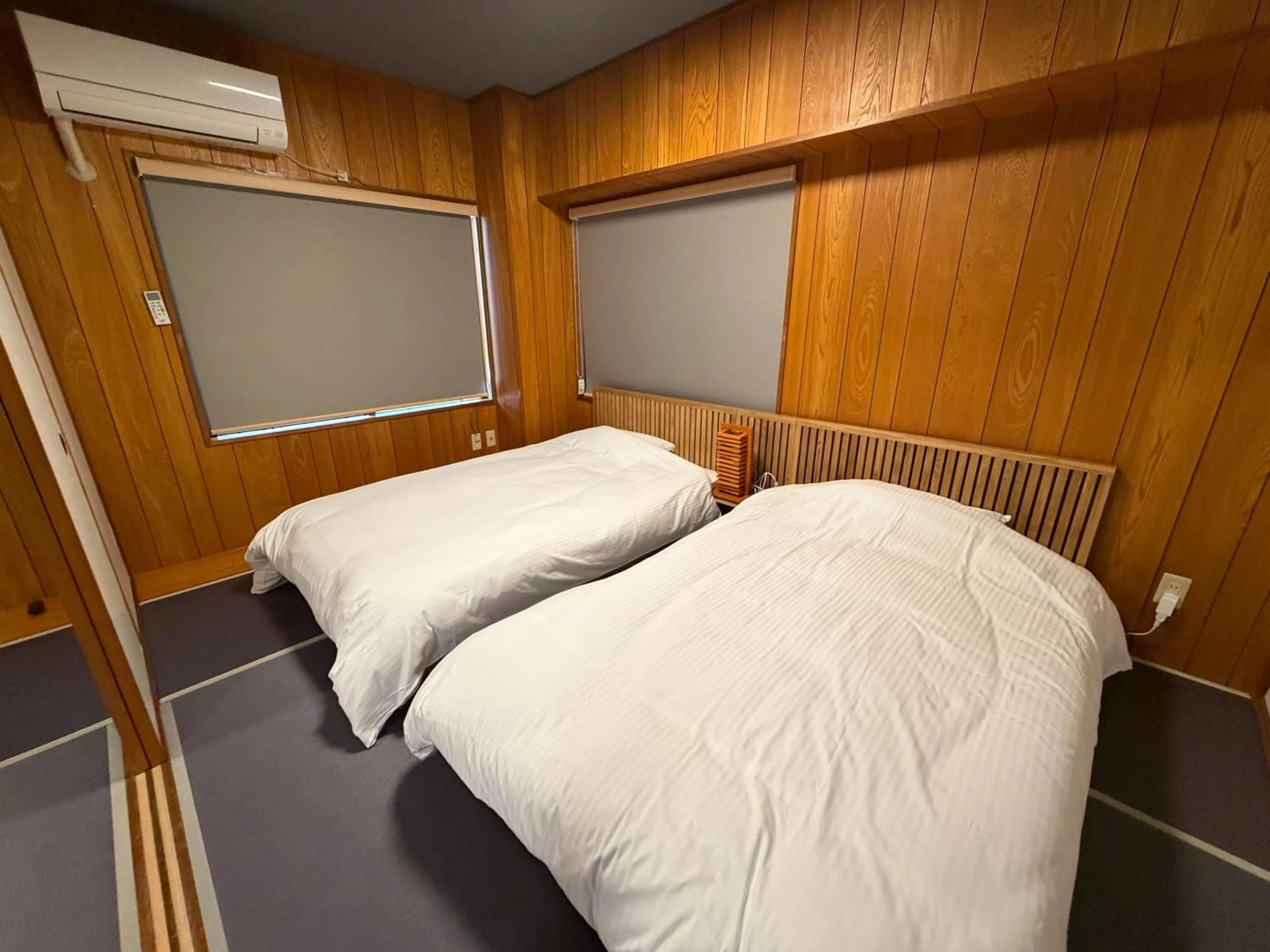 Bed in Kokusai Towns Inn