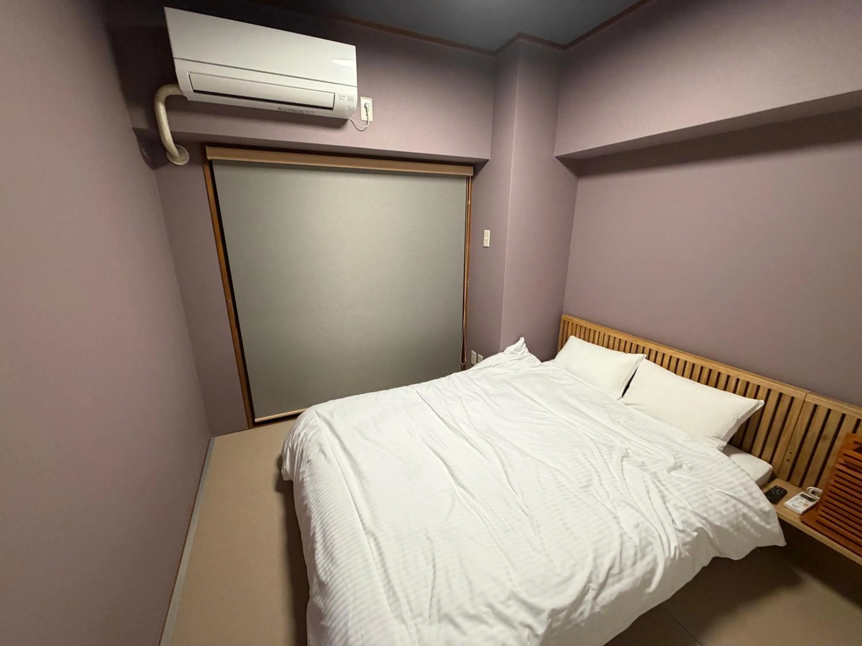 Bed in Kokusai Towns Inn