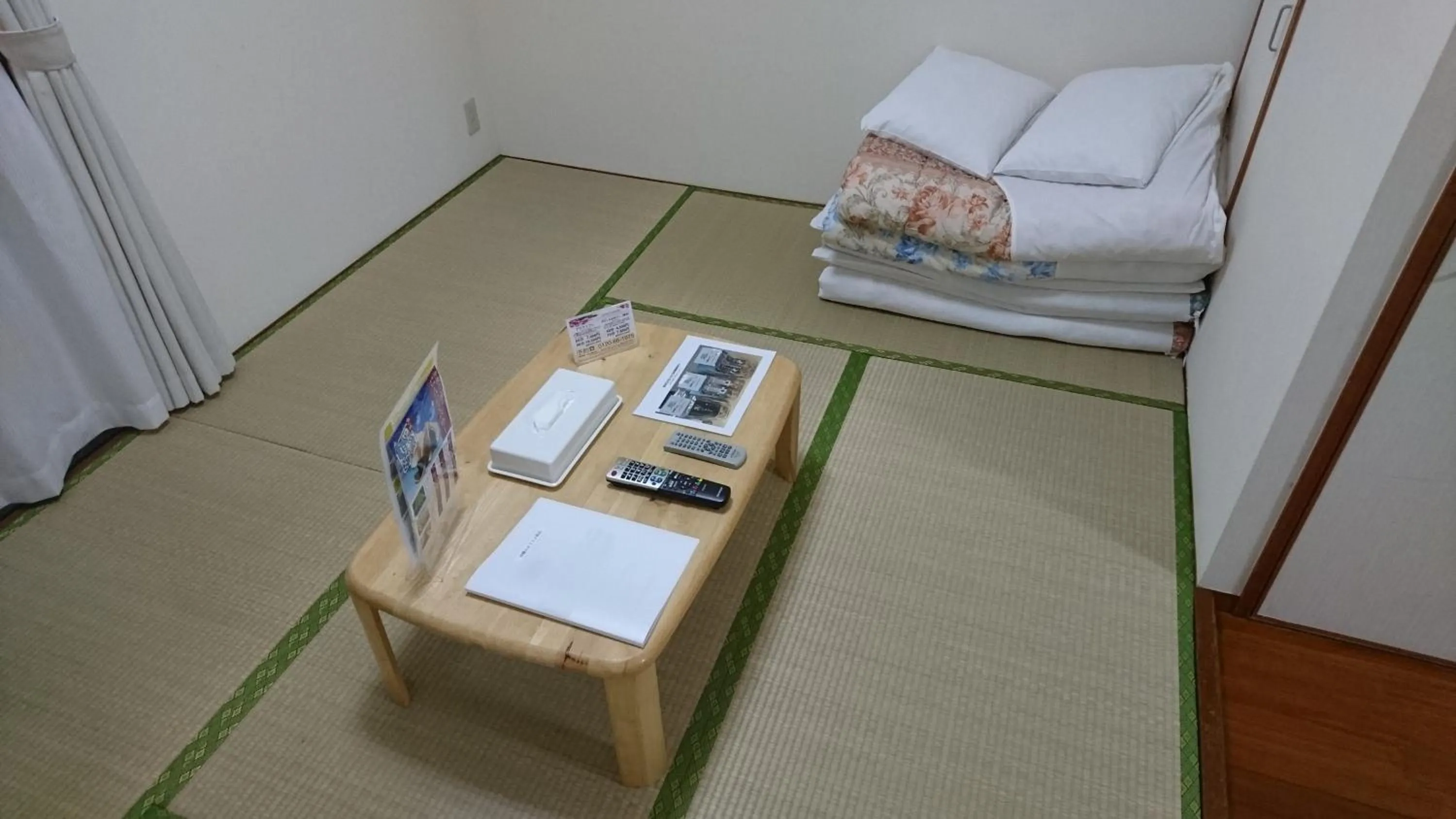 Bed in Kokusai Towns Inn