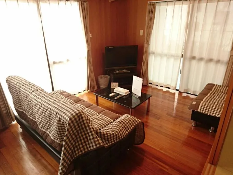 Living room in Kokusai Towns Inn