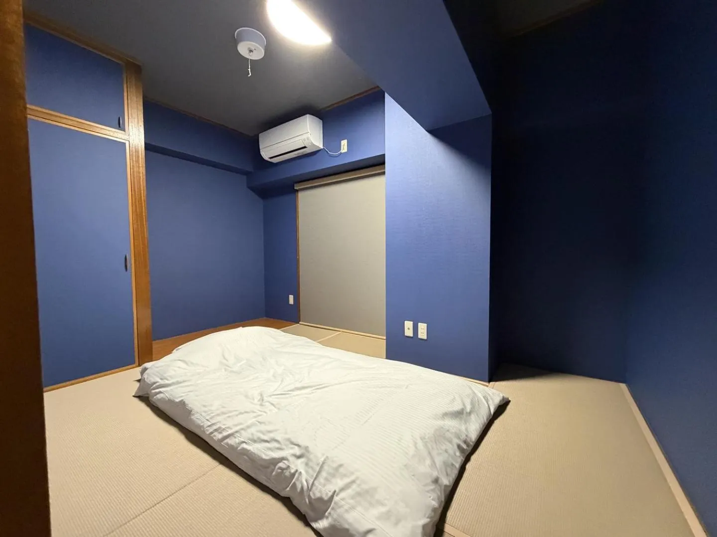 Bed in Kokusai Towns Inn