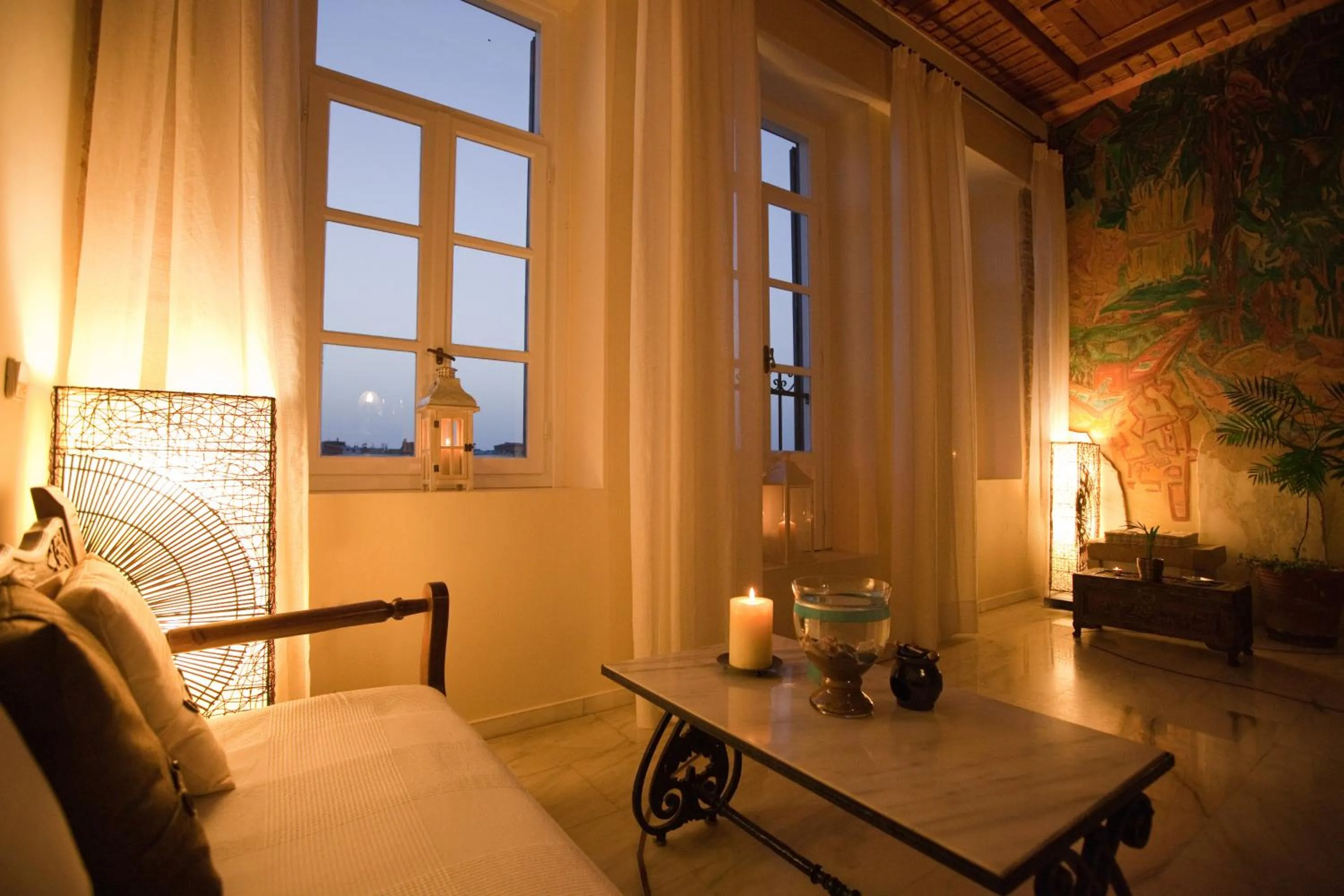 Seating area, Bed in Suites Pandora