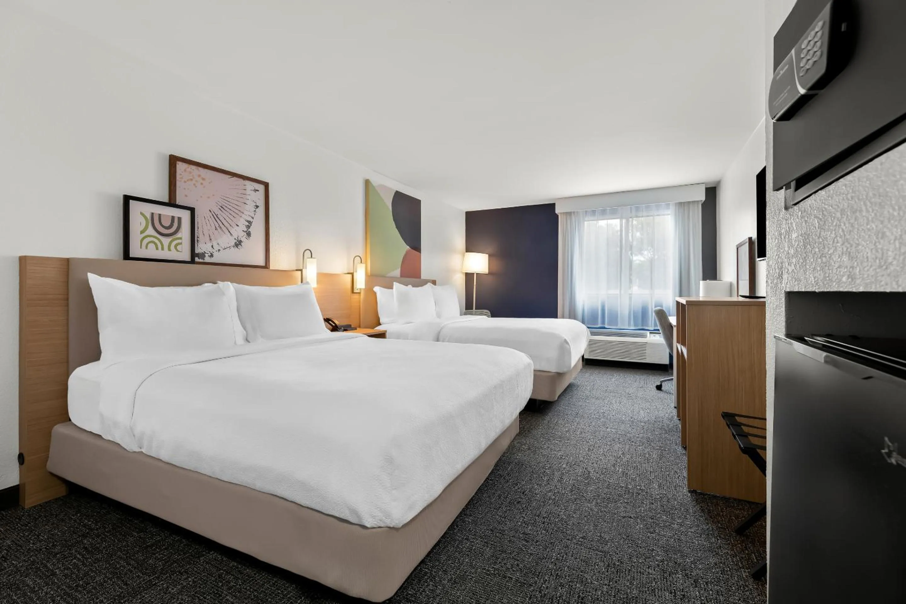 Bed in Spark By Hilton Biloxi Ocean Springs