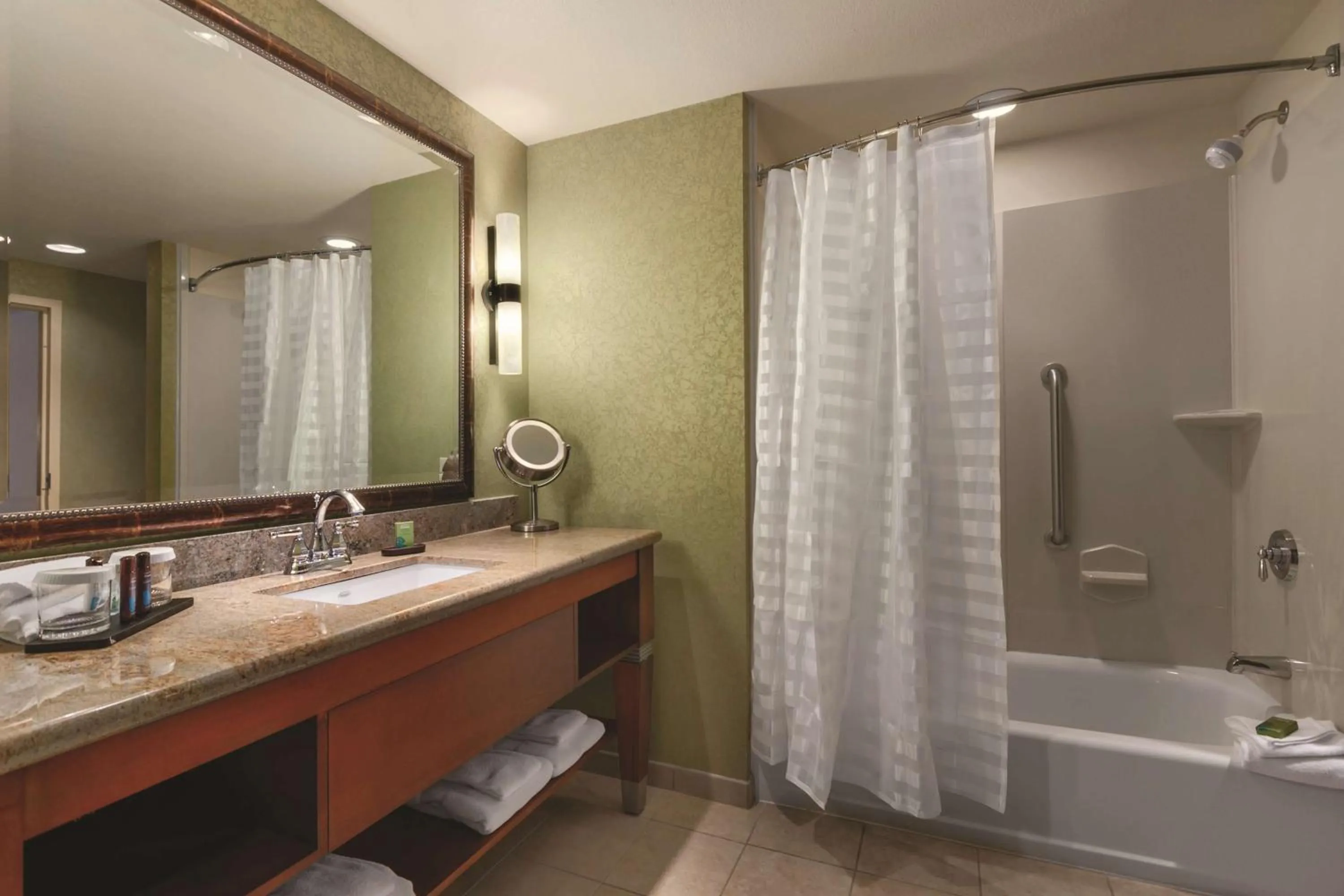 Bathroom in Embassy Suites Omaha- La Vista/ Hotel & Conference Center