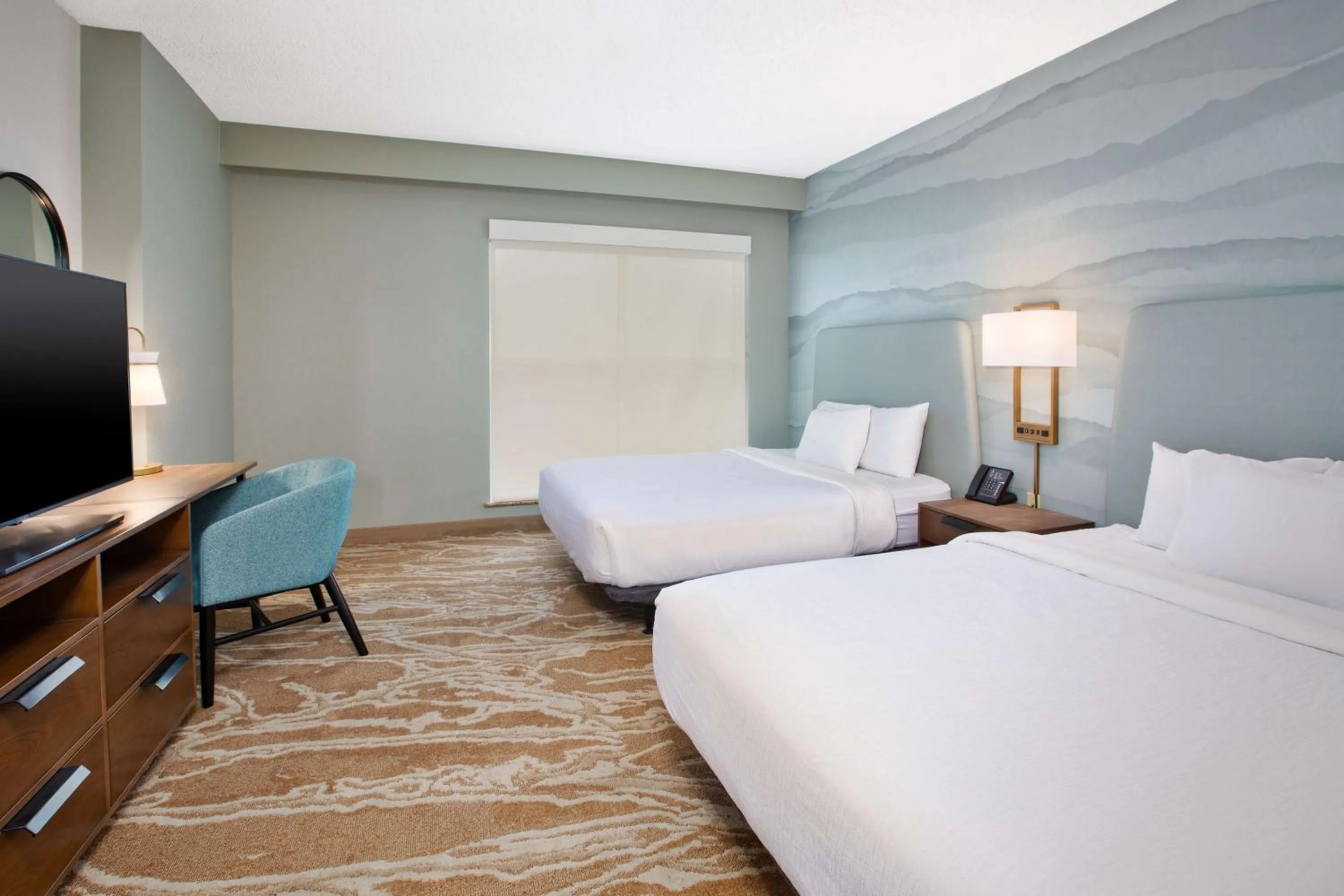 Bed in Embassy Suites San Marcos Hotel Conference Center