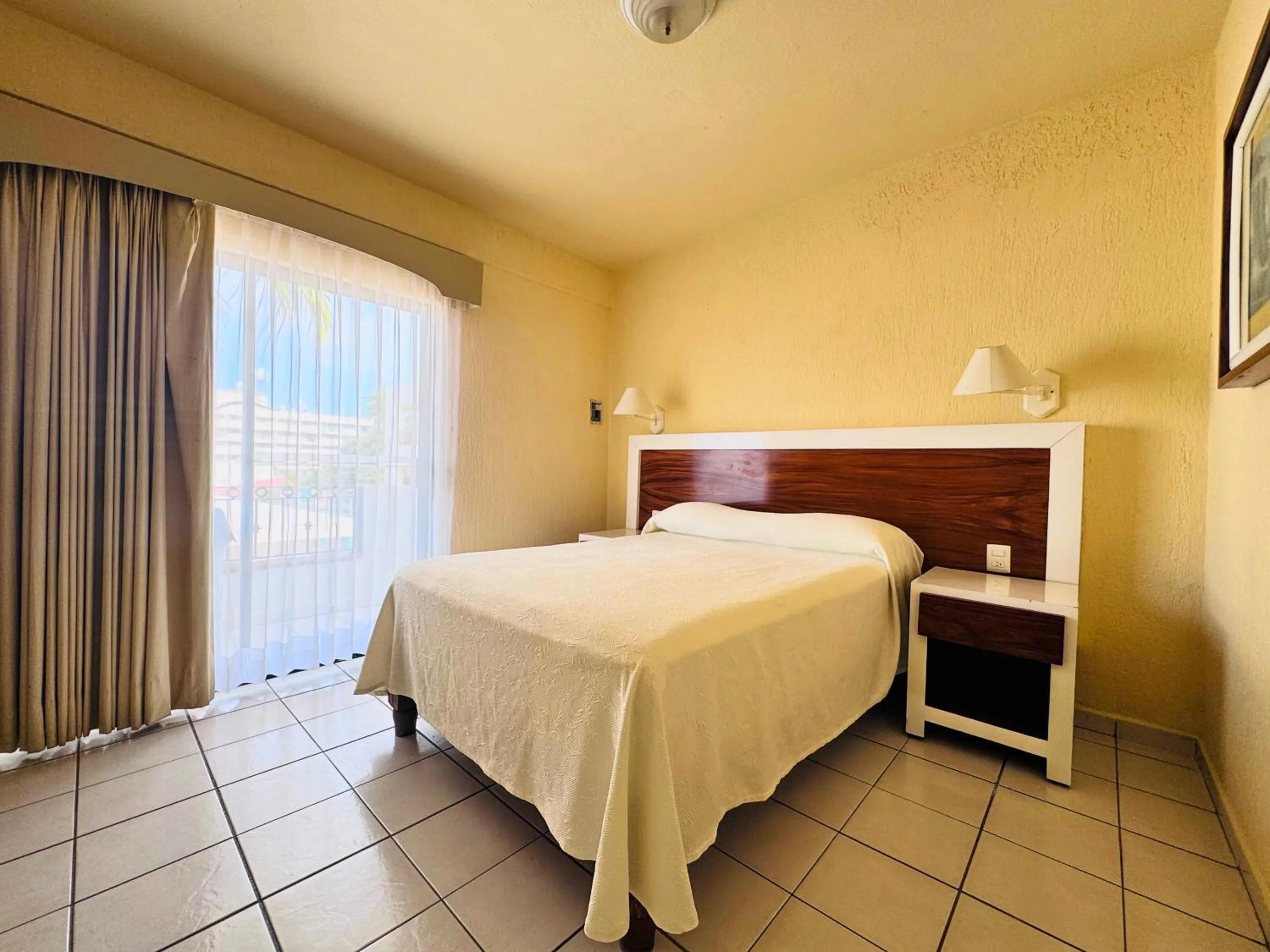 Bed in Tropicana Hotel Puerto Vallarta