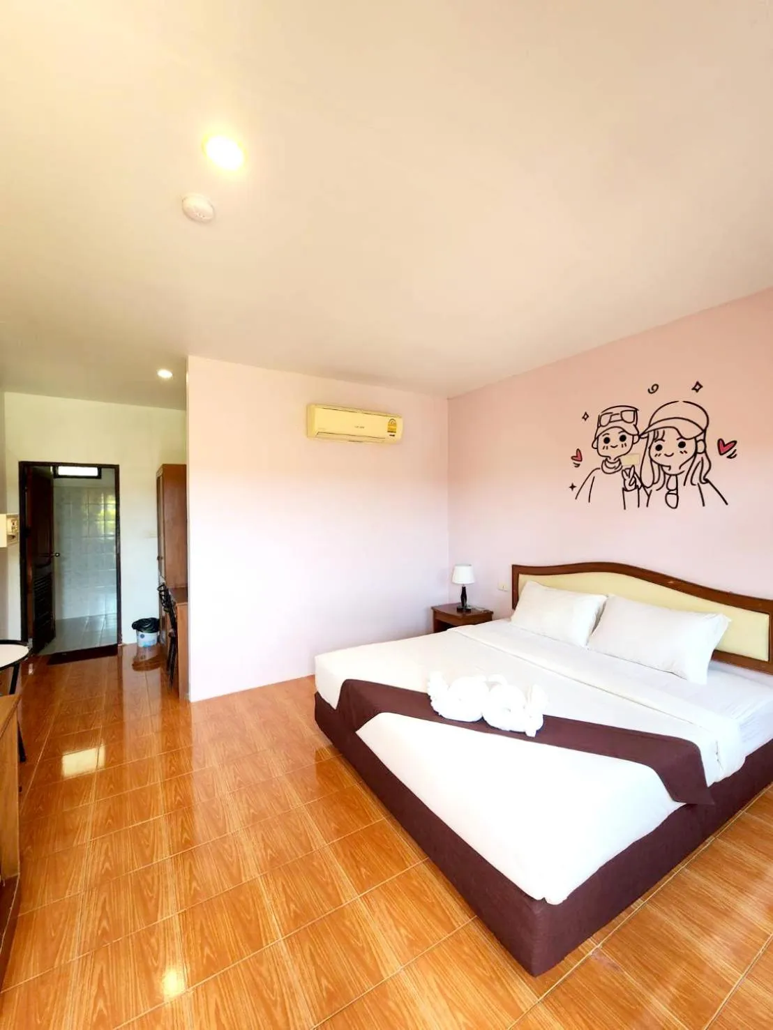 Bed in Mild Garden View Resort