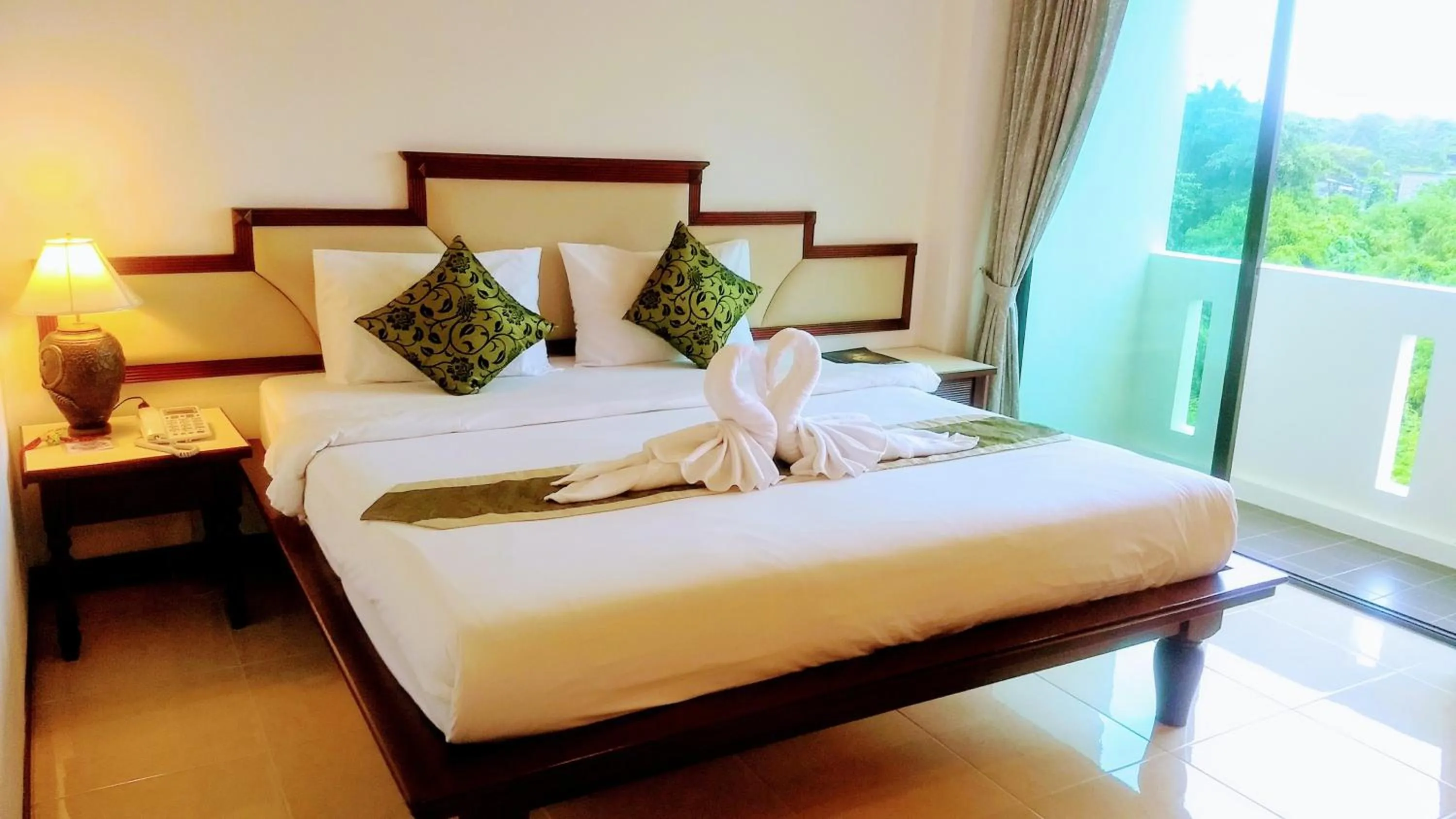 Bed in Mei Zhou Phuket Hotel - SHA Plus