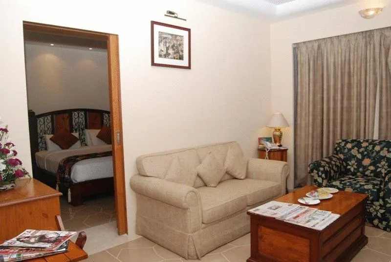 Living room, Bed in Beverly Hotel