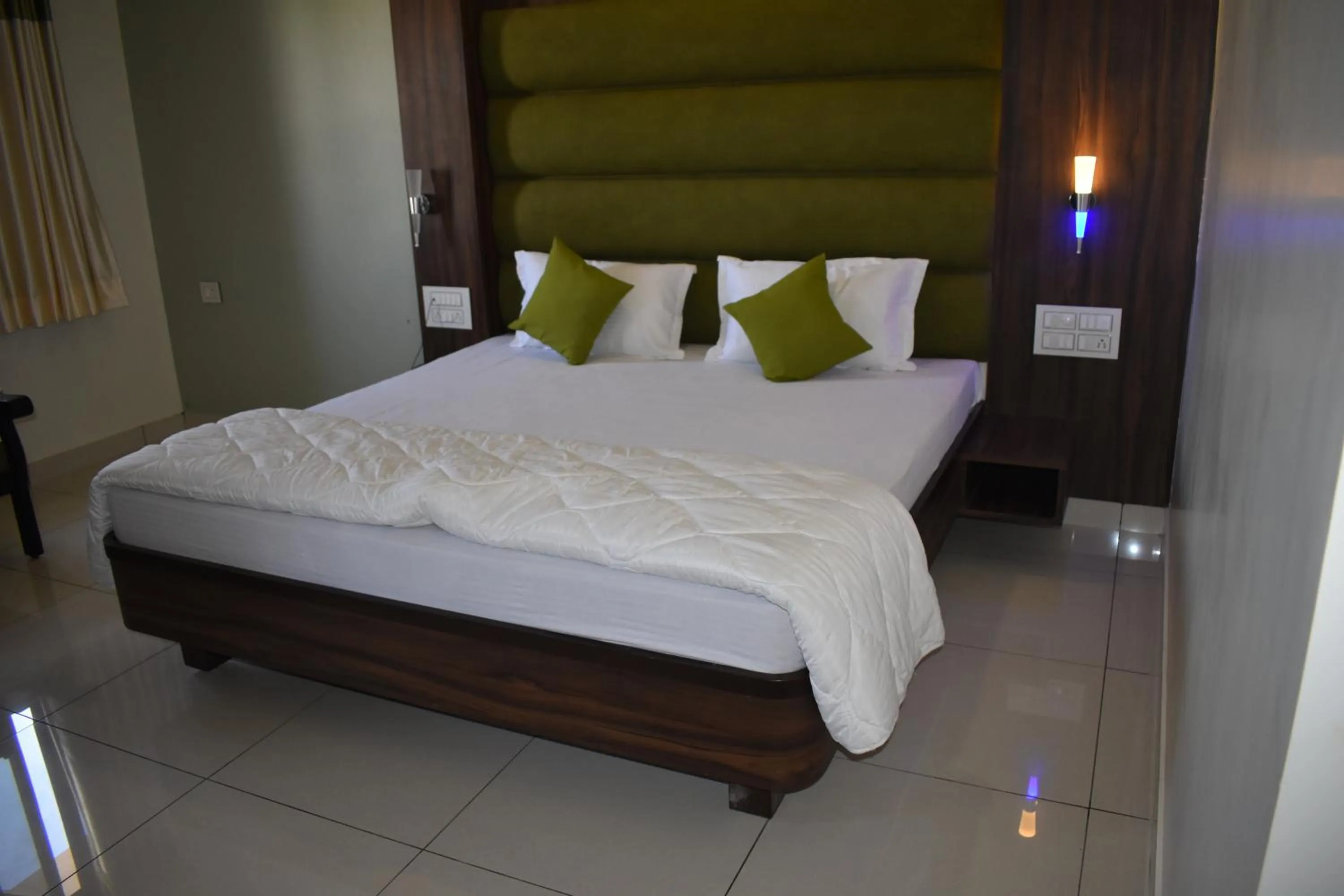 Bed in Hotel Shyam Palace